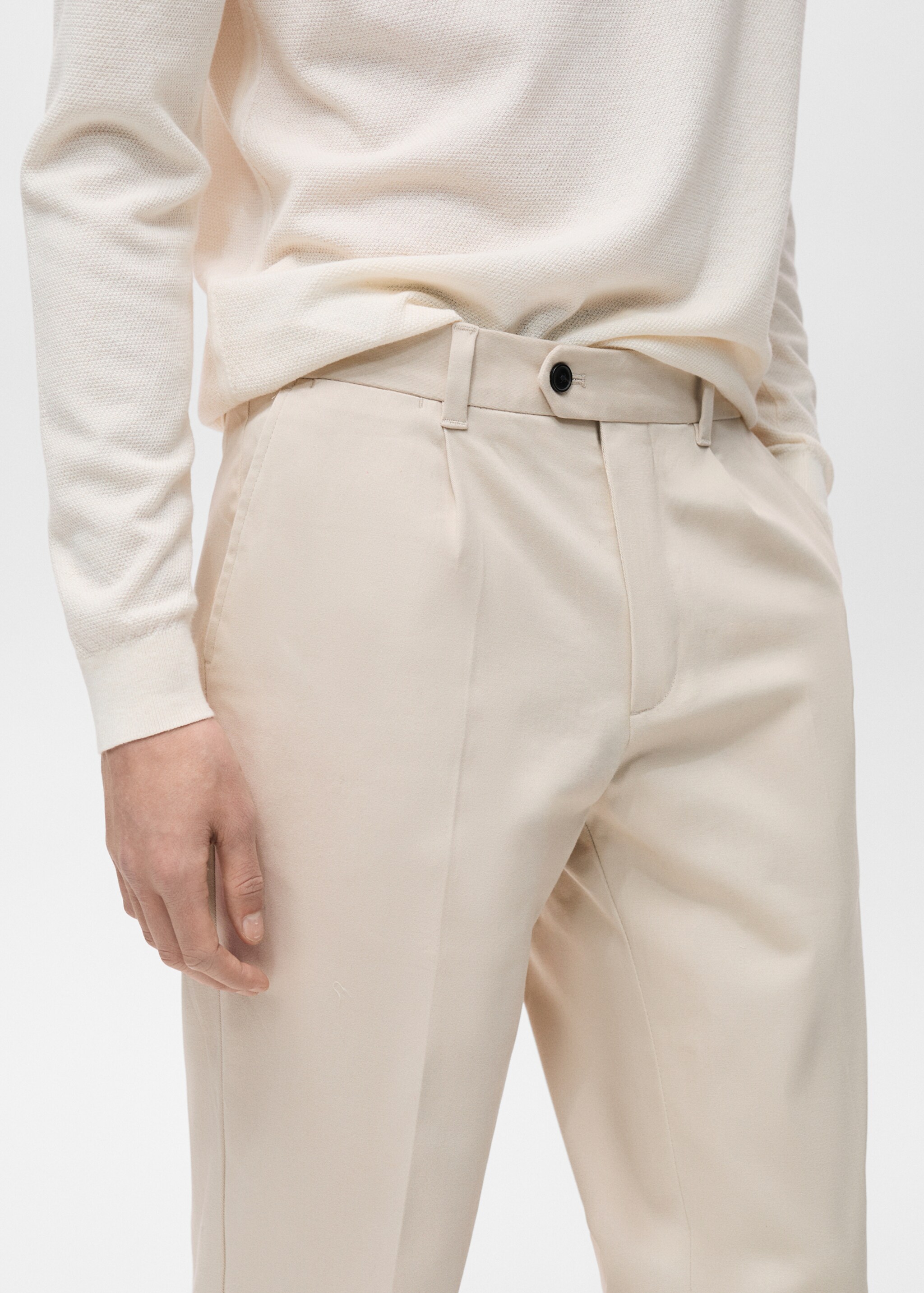 Bundfaltenhose mit Hosenaufschlag - Detail des Artikels 1, Beige. Ref: 87030579-00.