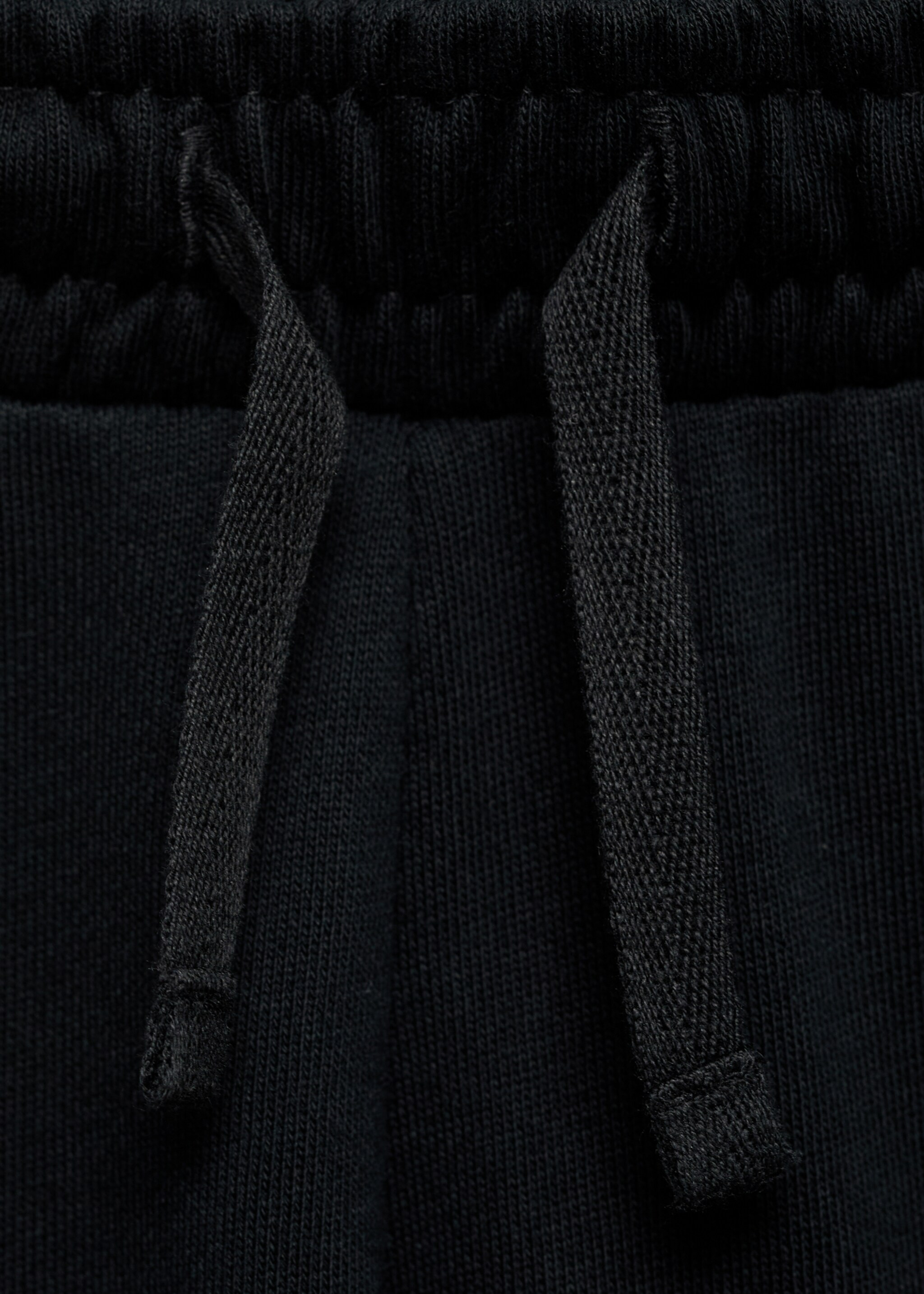 Cotton jogger-style trousers - Details of the article 8, Black. Ref: 87031046-00.
