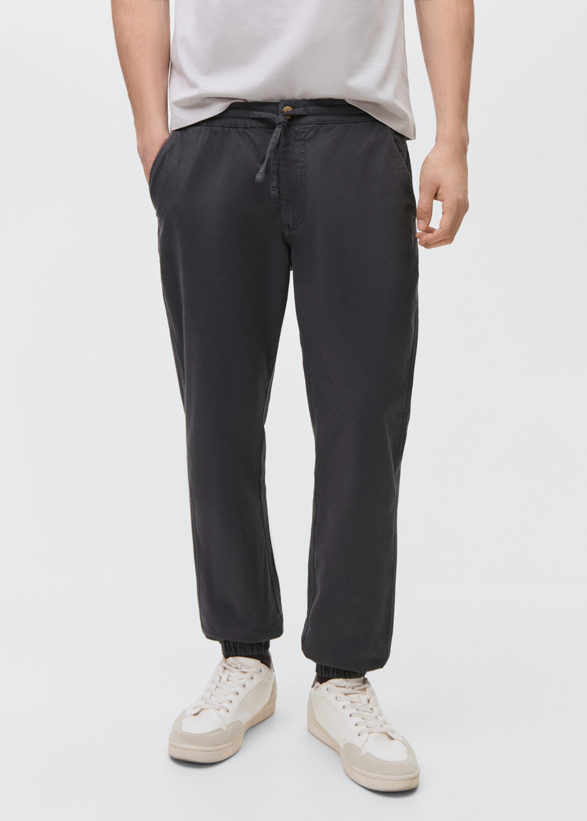 Cotton jogger-style trousers - Details of the article 6, Charcoal. Ref: 87031057-00.