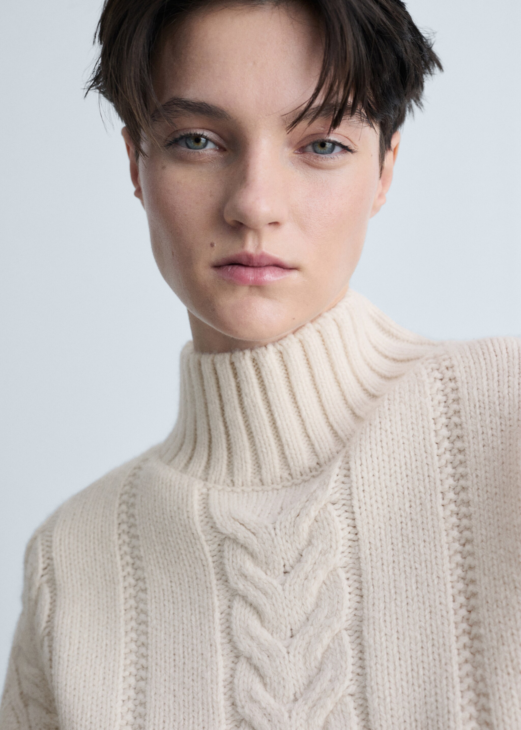 Braided sweater with perkins neck - Details of the article 1, Ecru. Ref: 87033272-00.