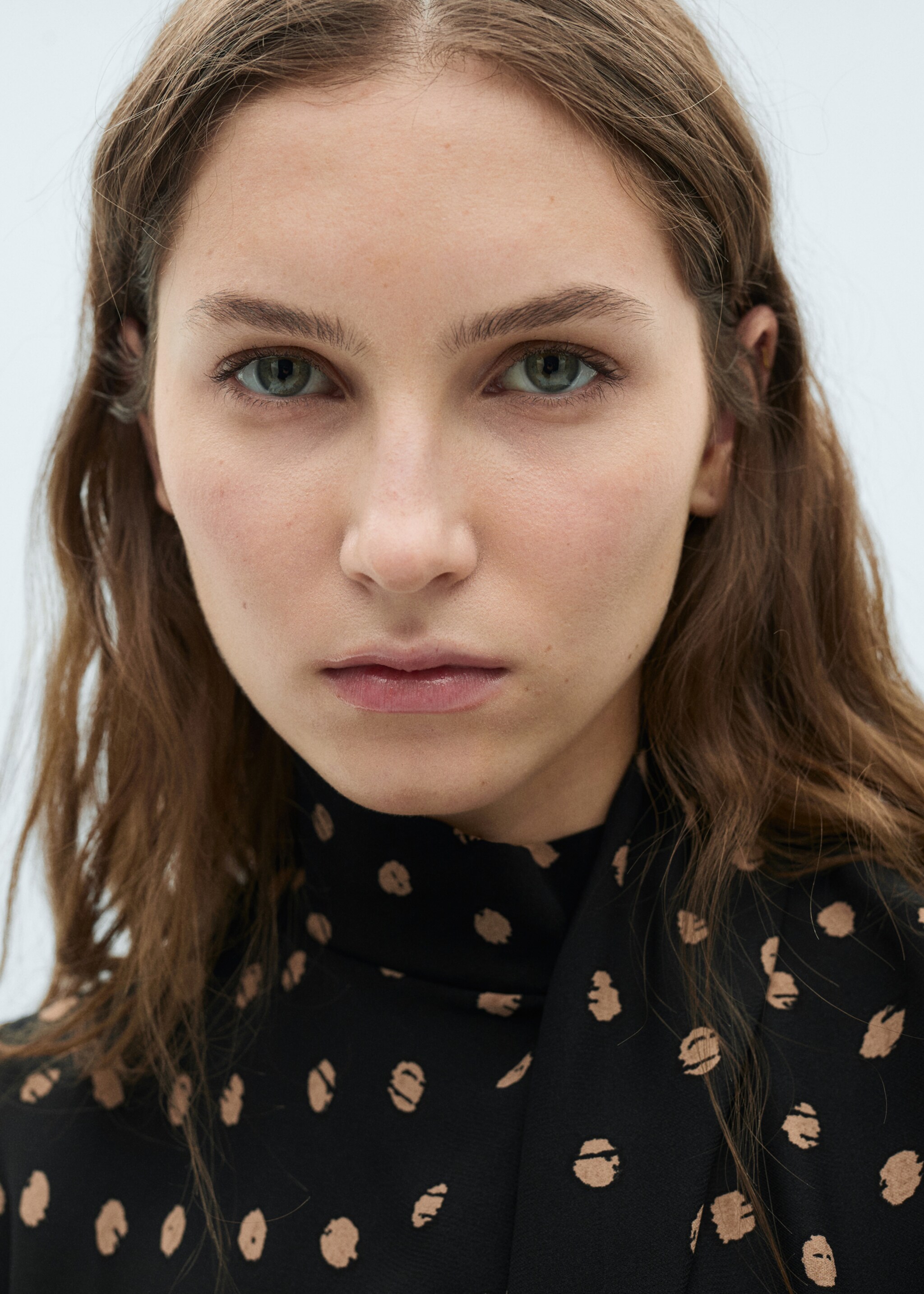 Polka-dot blouse with draped collar - Details of the article 1, Black. Ref: 87034071-00.