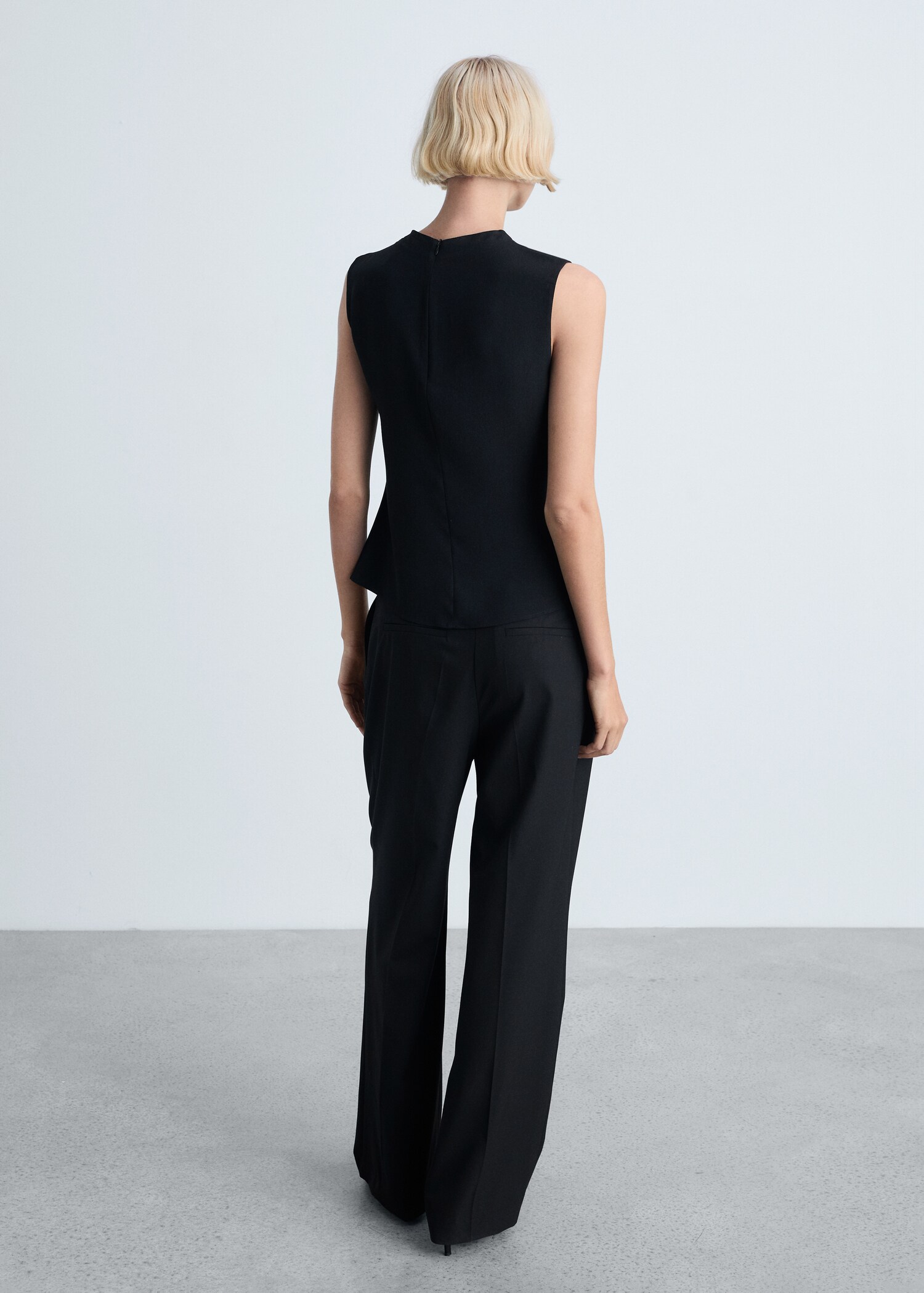 Brusa drapejada sense mànigues - Revers de l'article