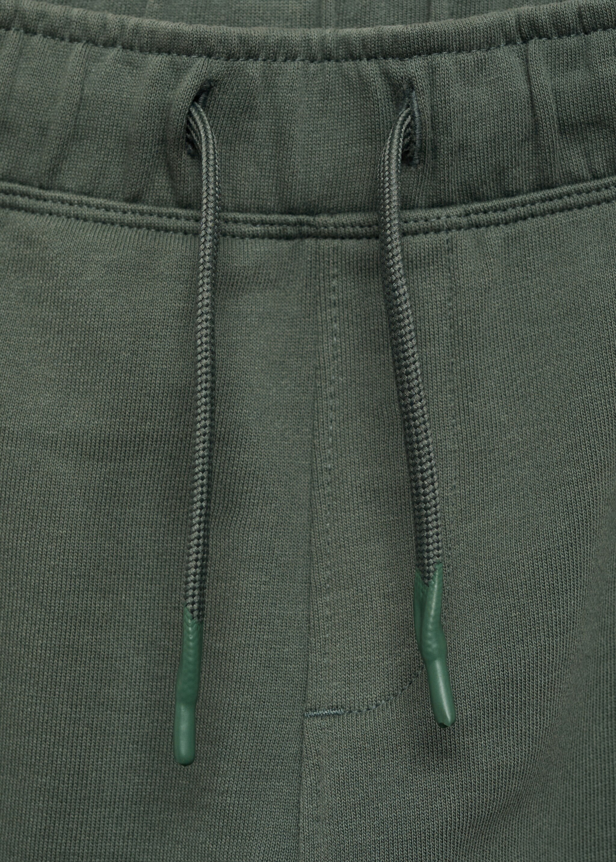 Cotton jogger-style trousers - Details of the article 8, Forest Green. Ref: 87035137-00.