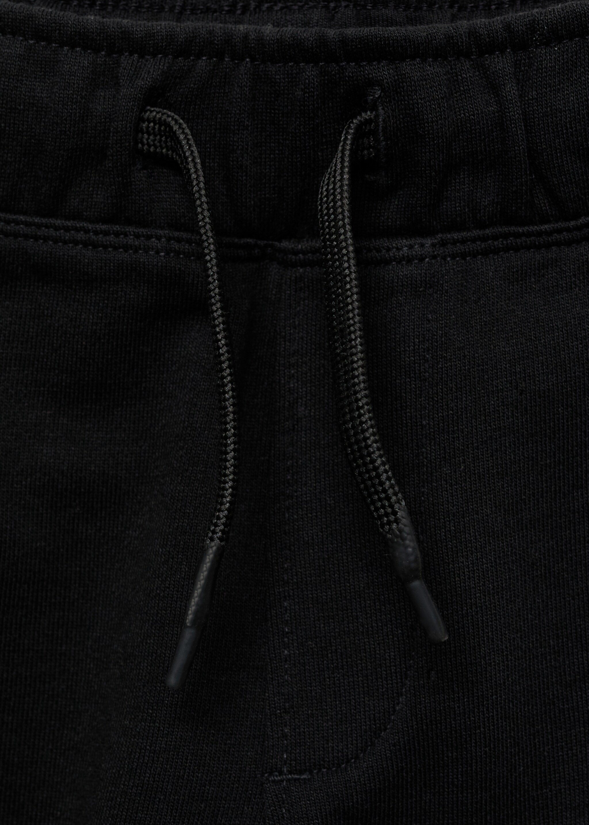 Cotton jogger-style trousers - Details of the article 8, Black. Ref: 87035137-00.