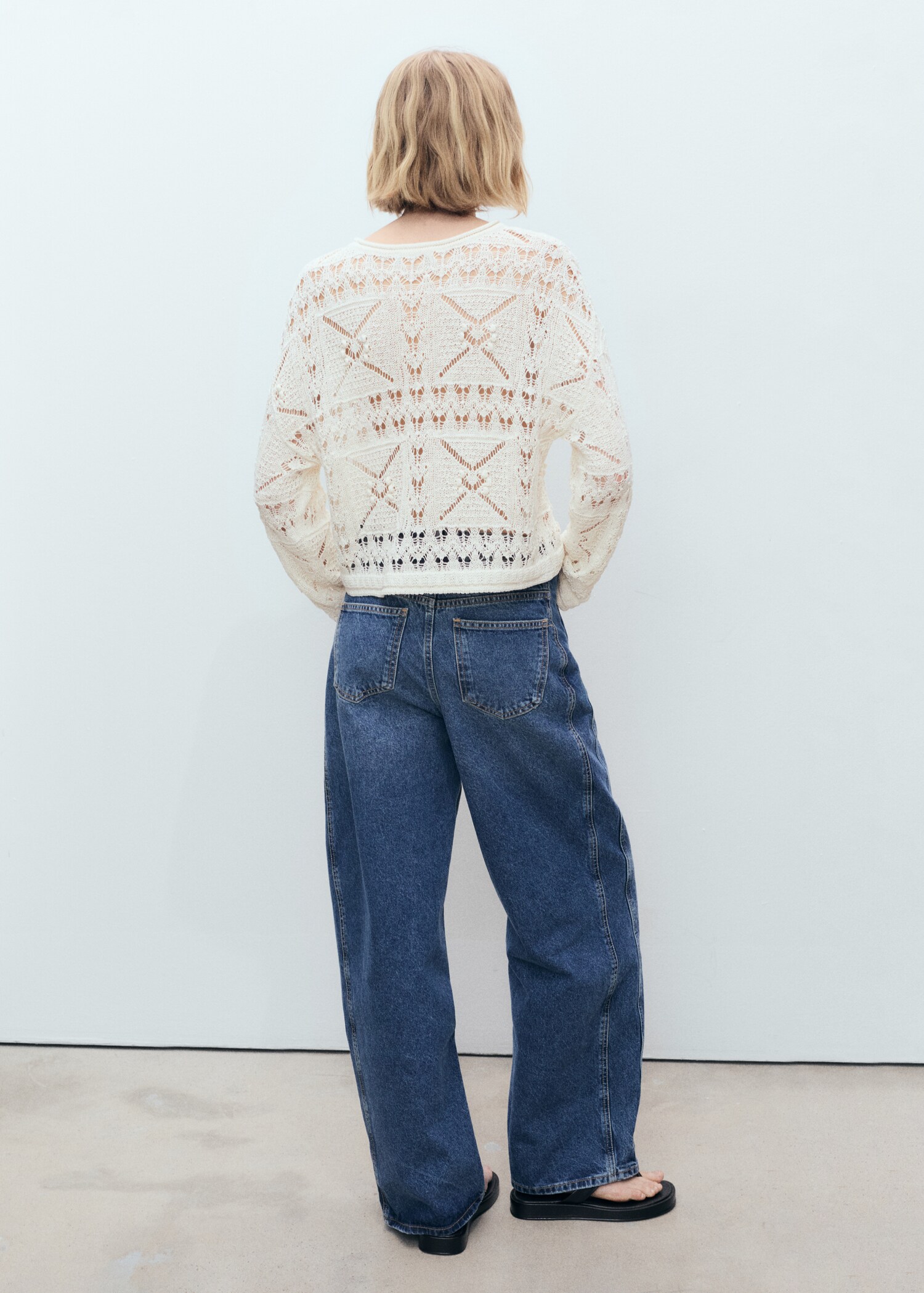 Oversized openwork knitted sweater - Reverse of the article
