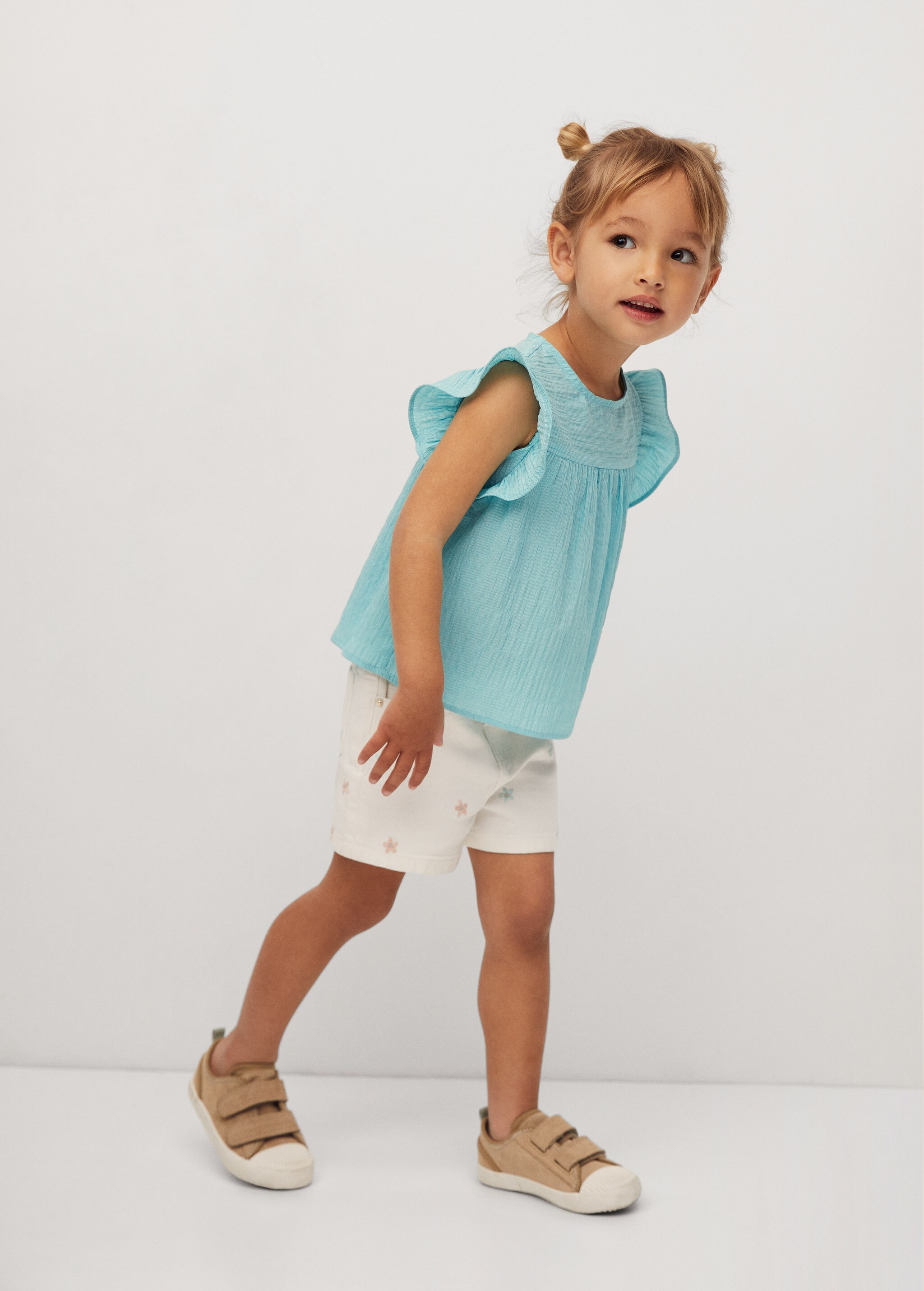 Blusa textura volantes - Plano medio