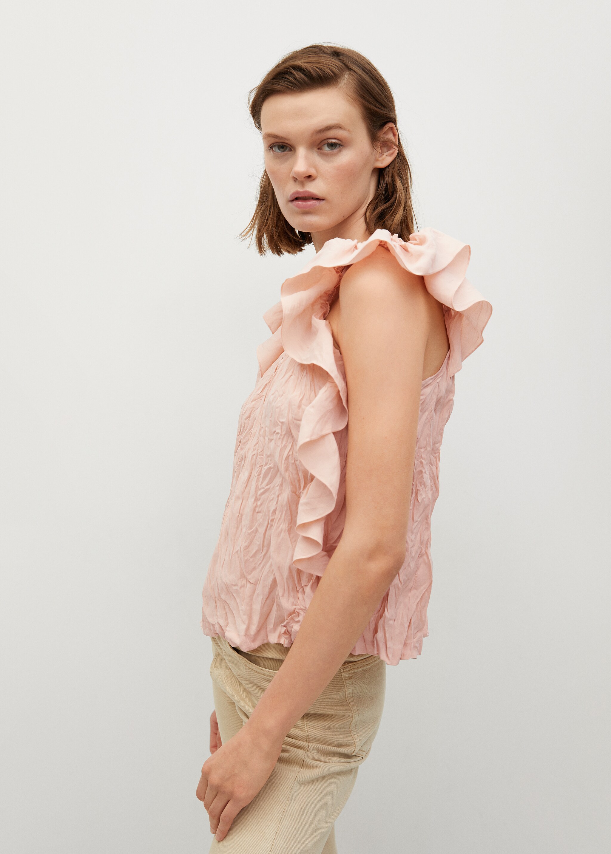 Blusa textura volantes - Plano medio