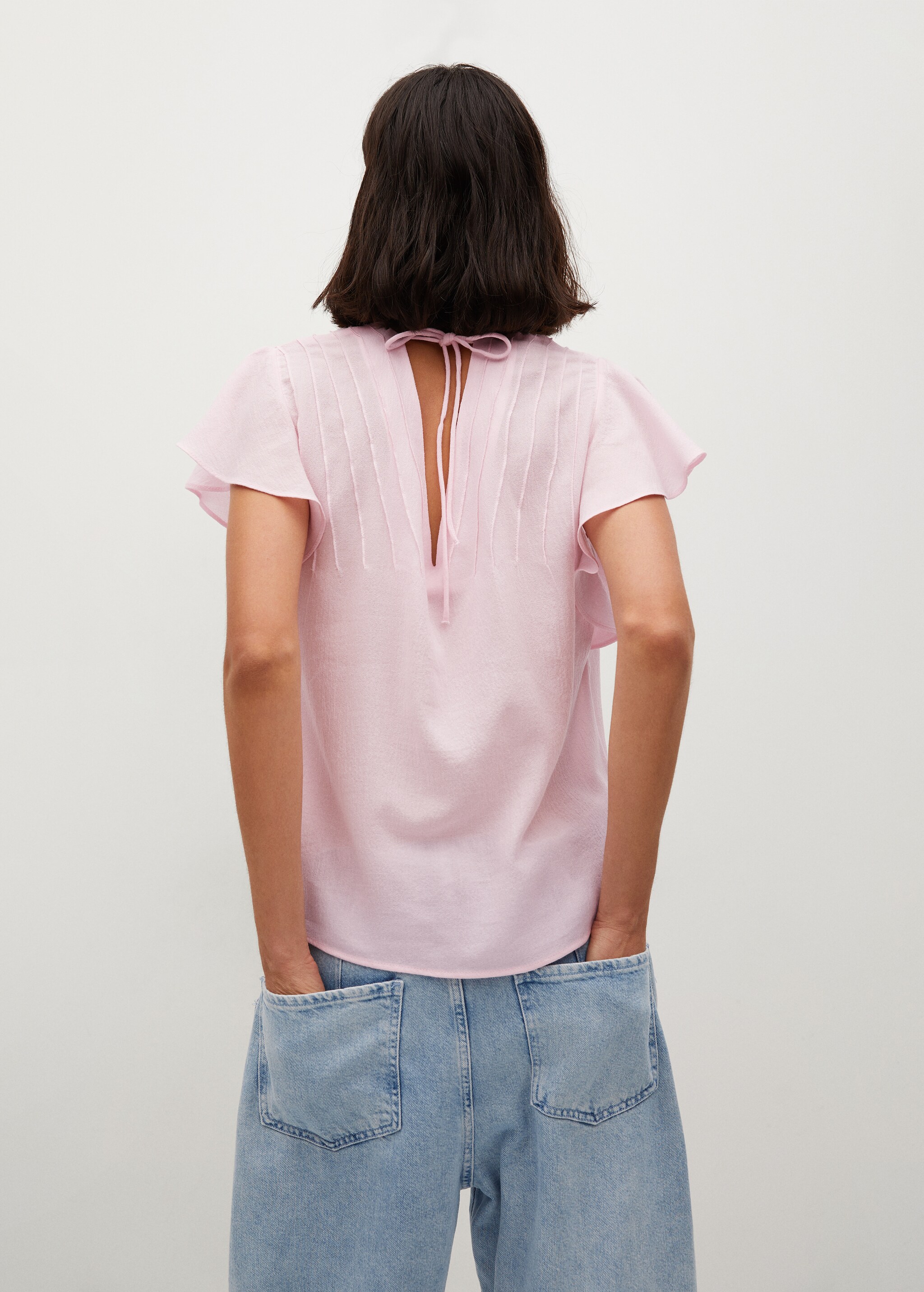 Blusa textura lazo - Reverso del artículo