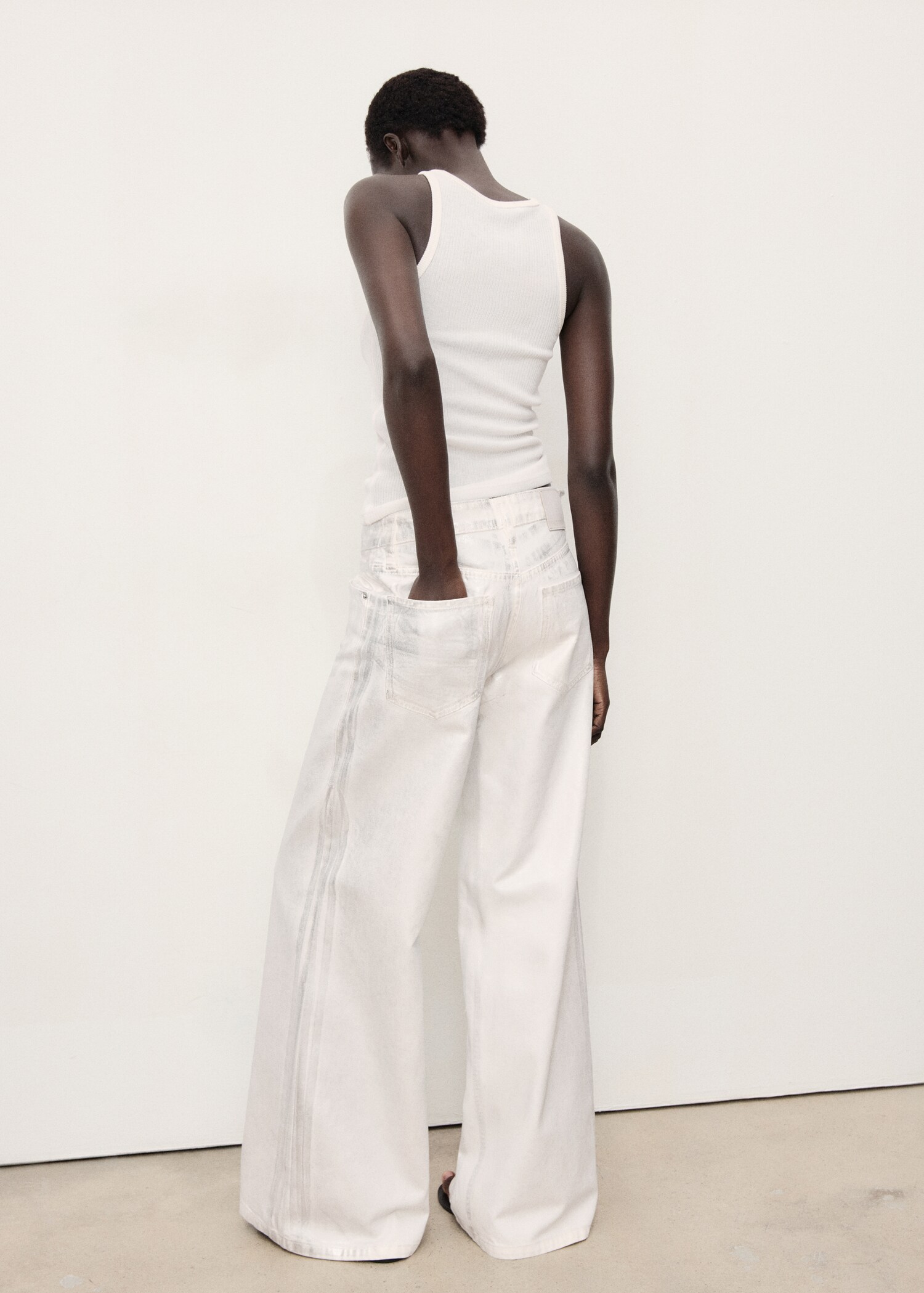 Metallic-finish wide leg jeans - Reverse of the article