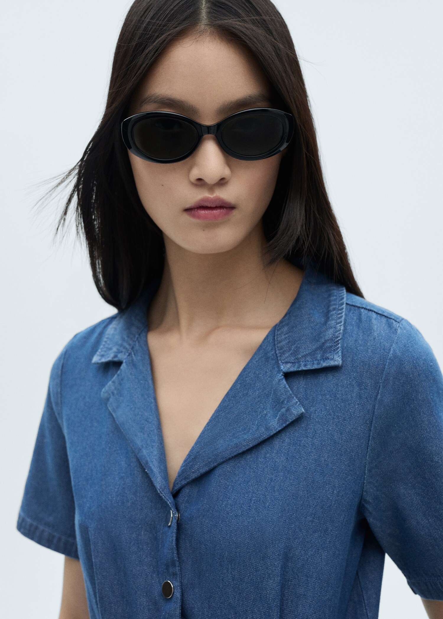 Short-sleeved denim jumpsuit - Reverse of the article