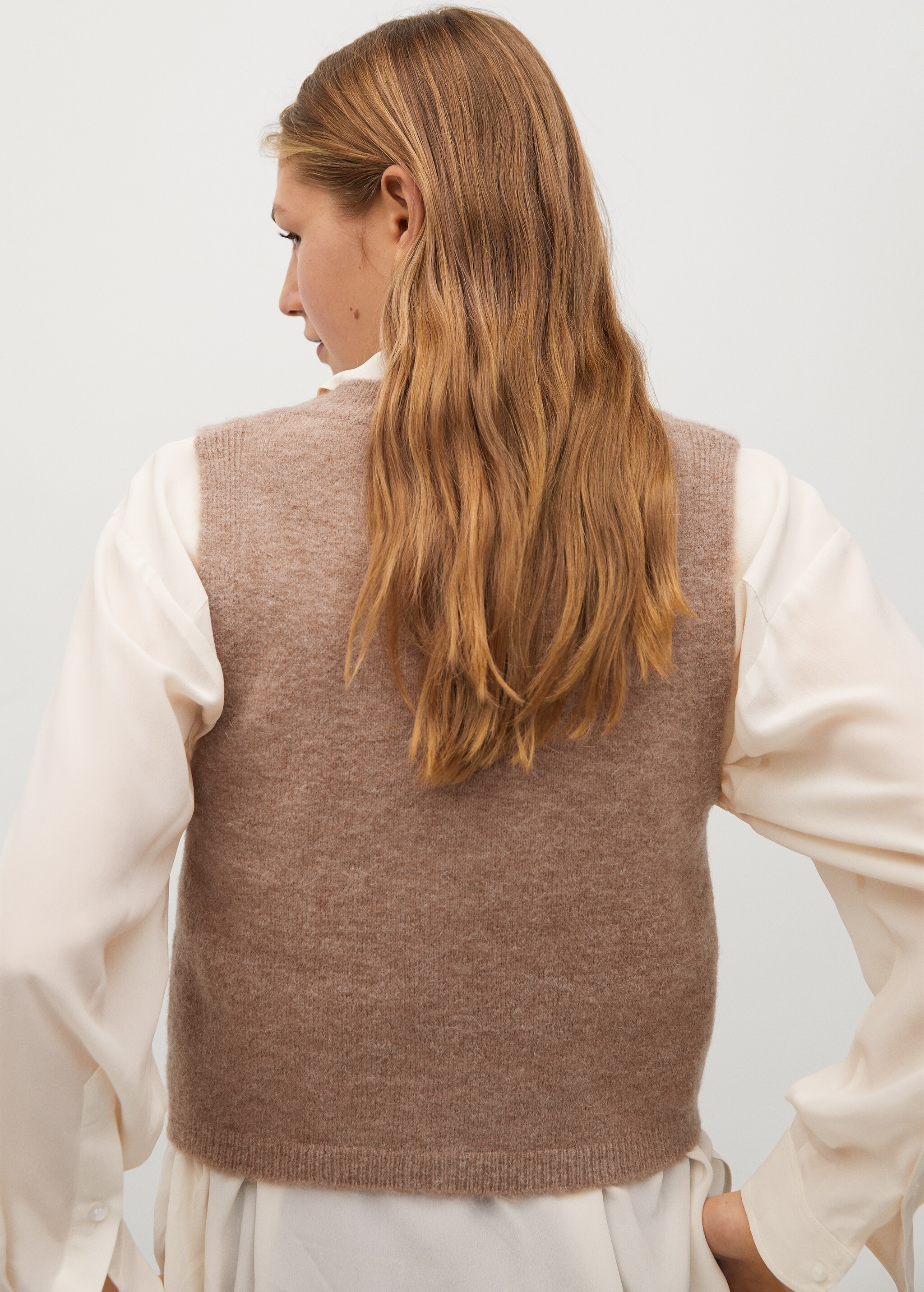 Knitted gilet with buttons - Reverse of the article