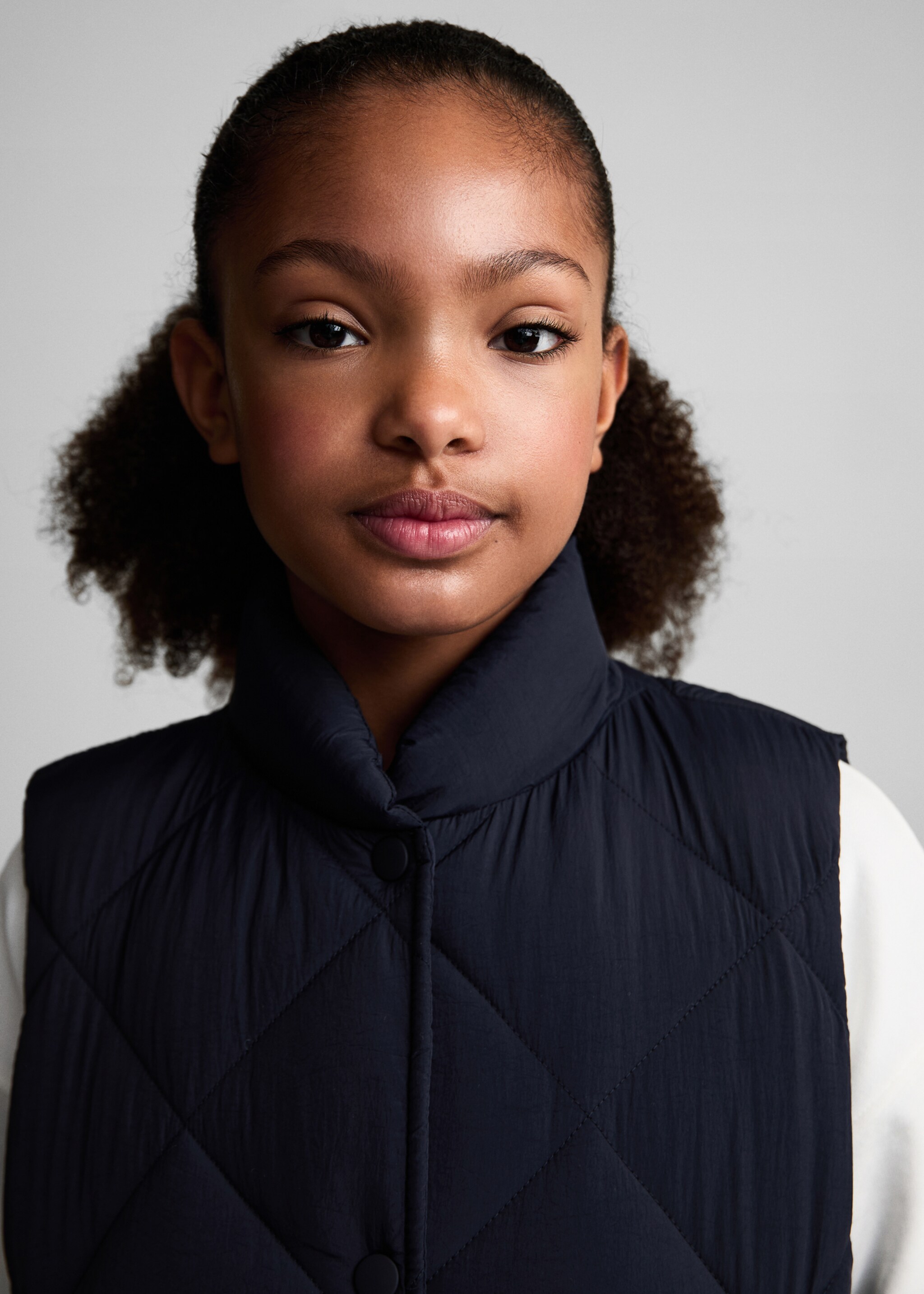 Ruitvormig doorgestikte bodywarmer - Detail van het artikel 1, Donkermarine. Ref: 87042891-00.