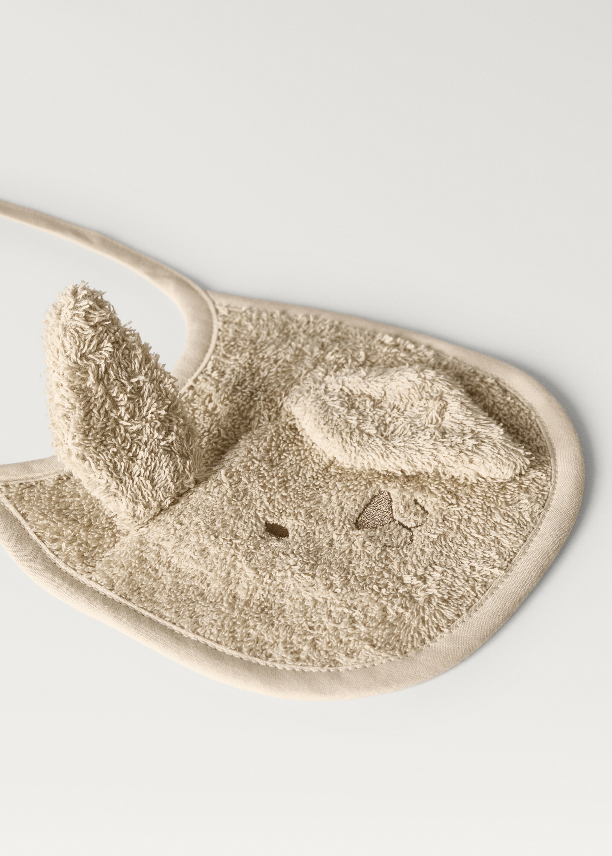 Badstoffen slab met oortjes - Detail van het artikel 1, Open beige. Ref: 87043310-00.