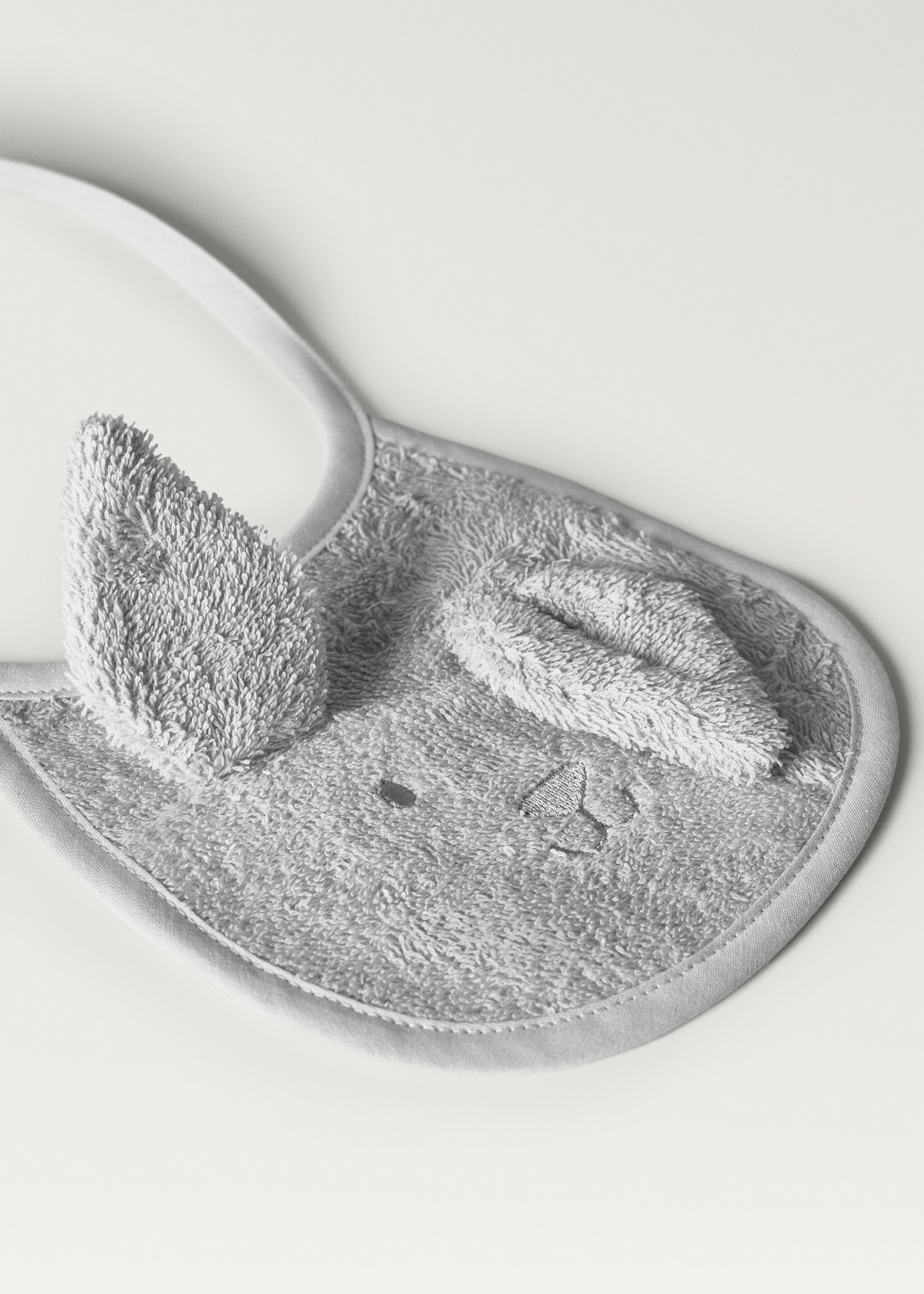 Badstoffen slab met oortjes - Detail van het artikel 1, Grijs. Ref: 87043310-00.