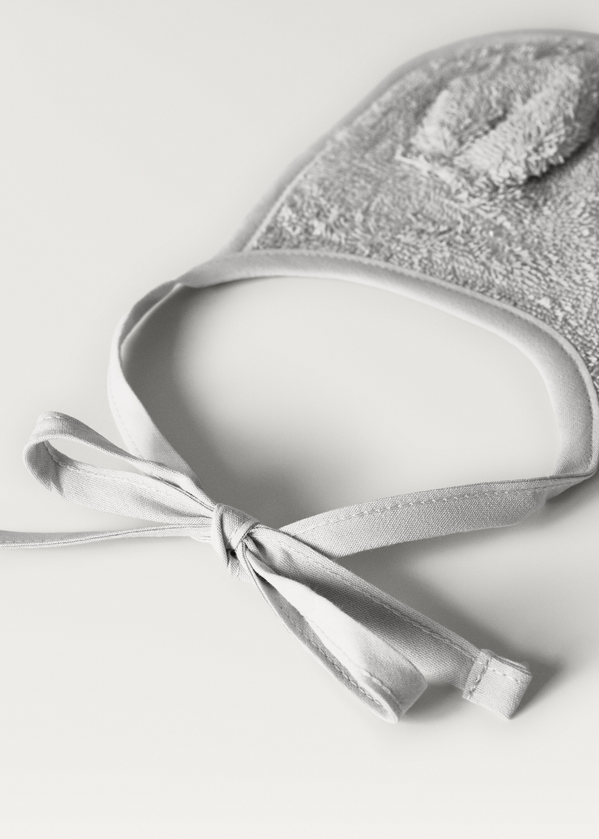 Badstoffen slab met oortjes - Detail van het artikel 2, Grijs. Ref: 87043310-00.