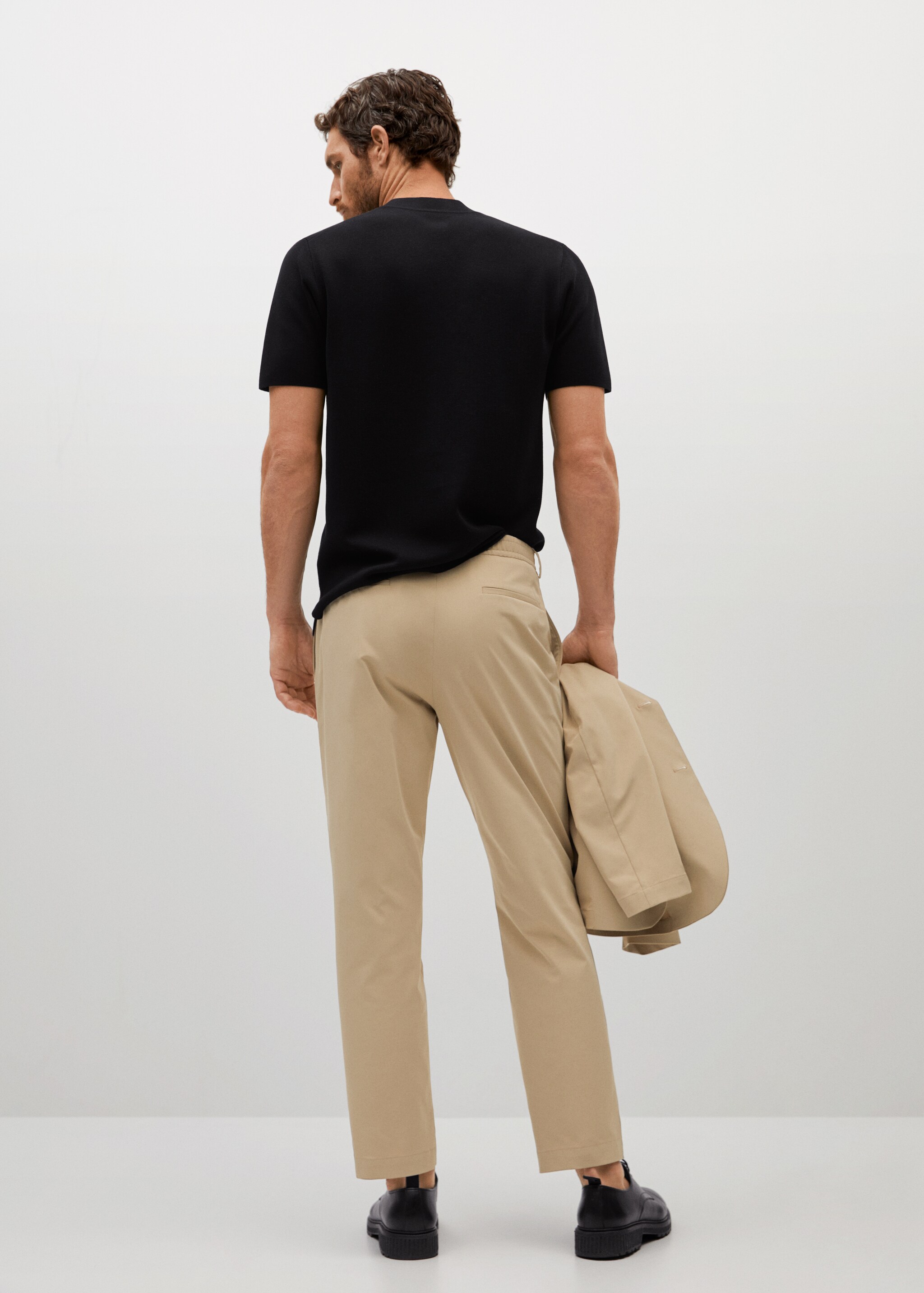 Pantalón traje slim fit tejido técnico - Reverso del artículo