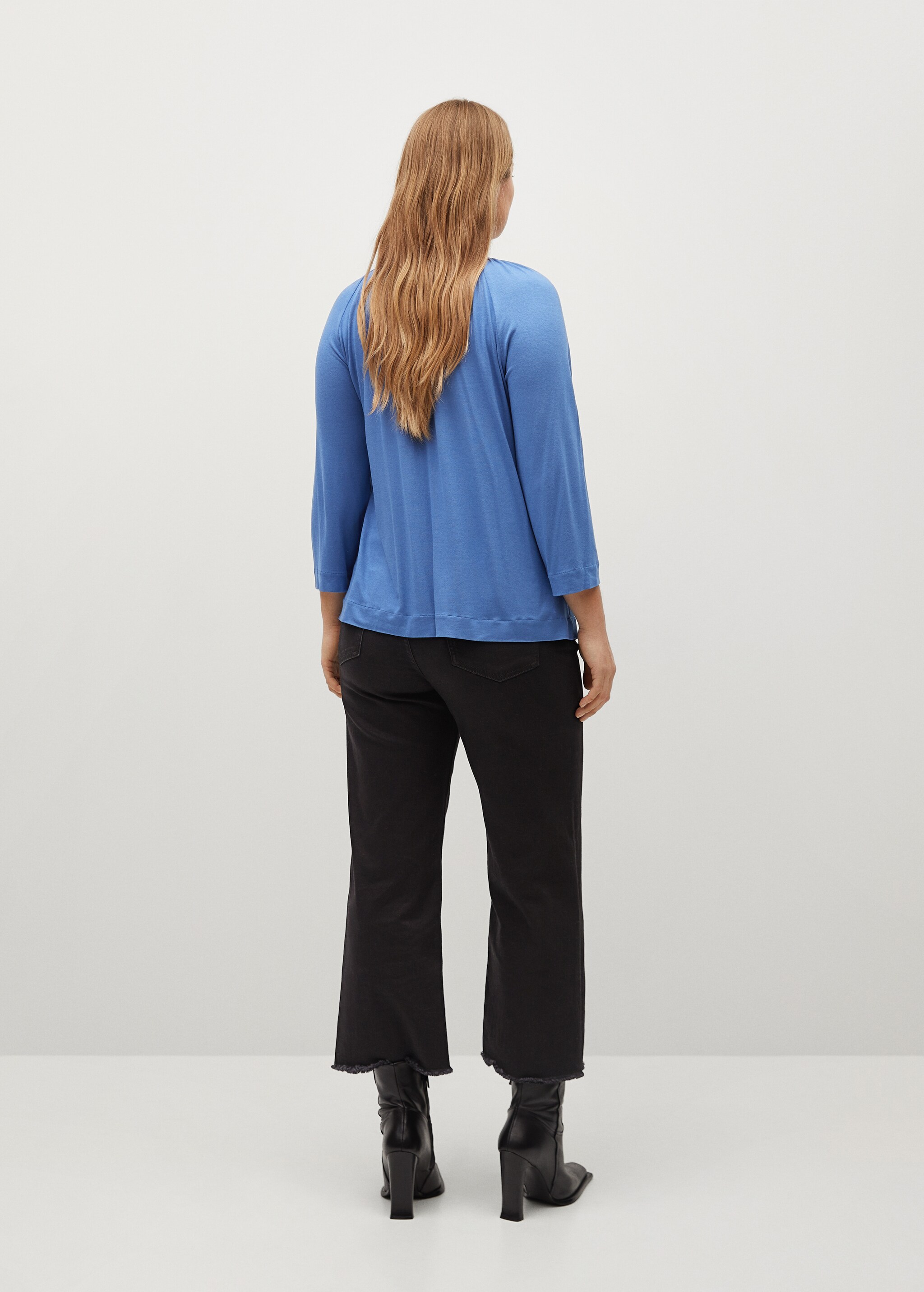 Long-sleeved t-shirt with bows - Reverse of the article