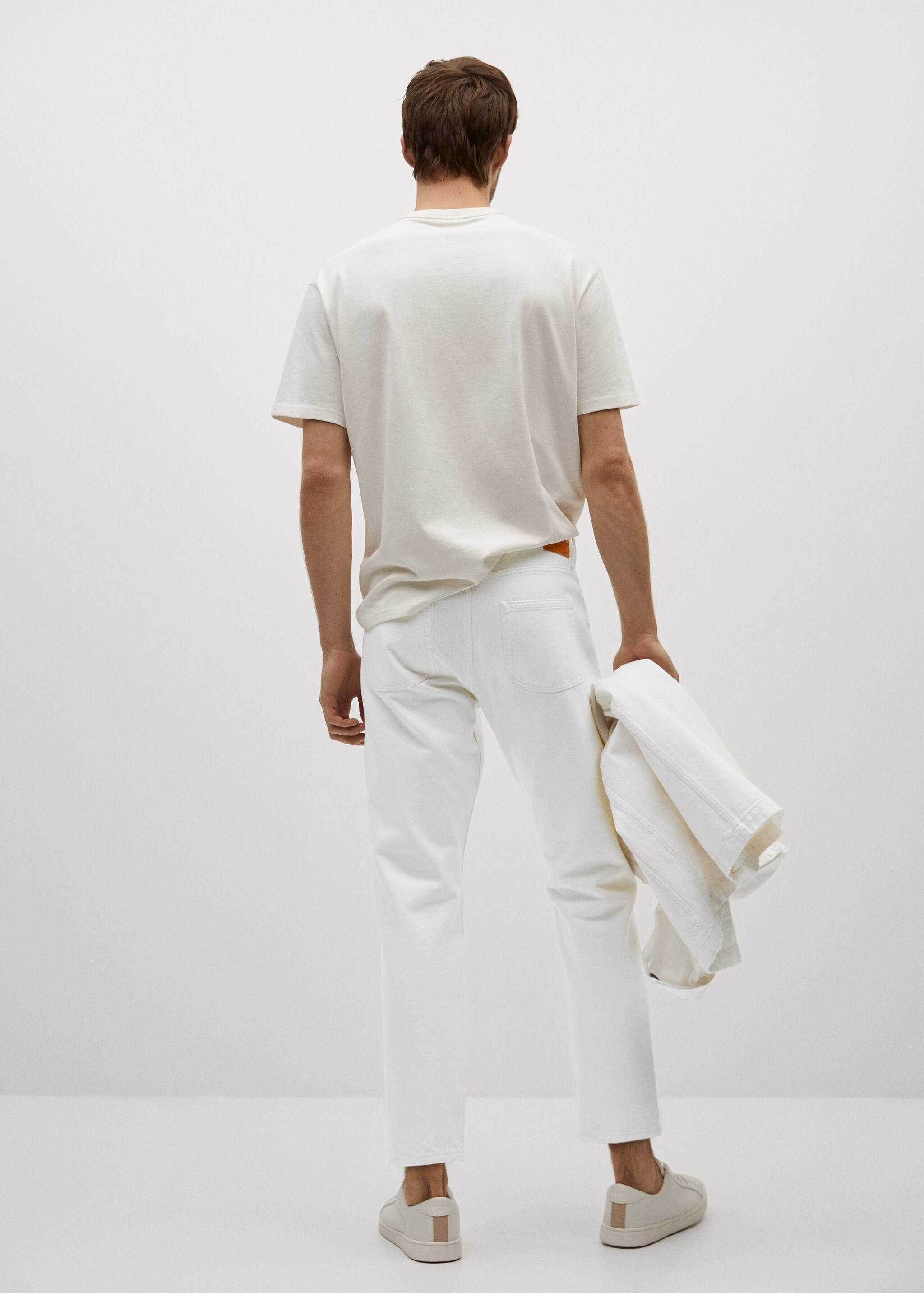 Jeans Ben tapered fit blancos - Reverso del artículo