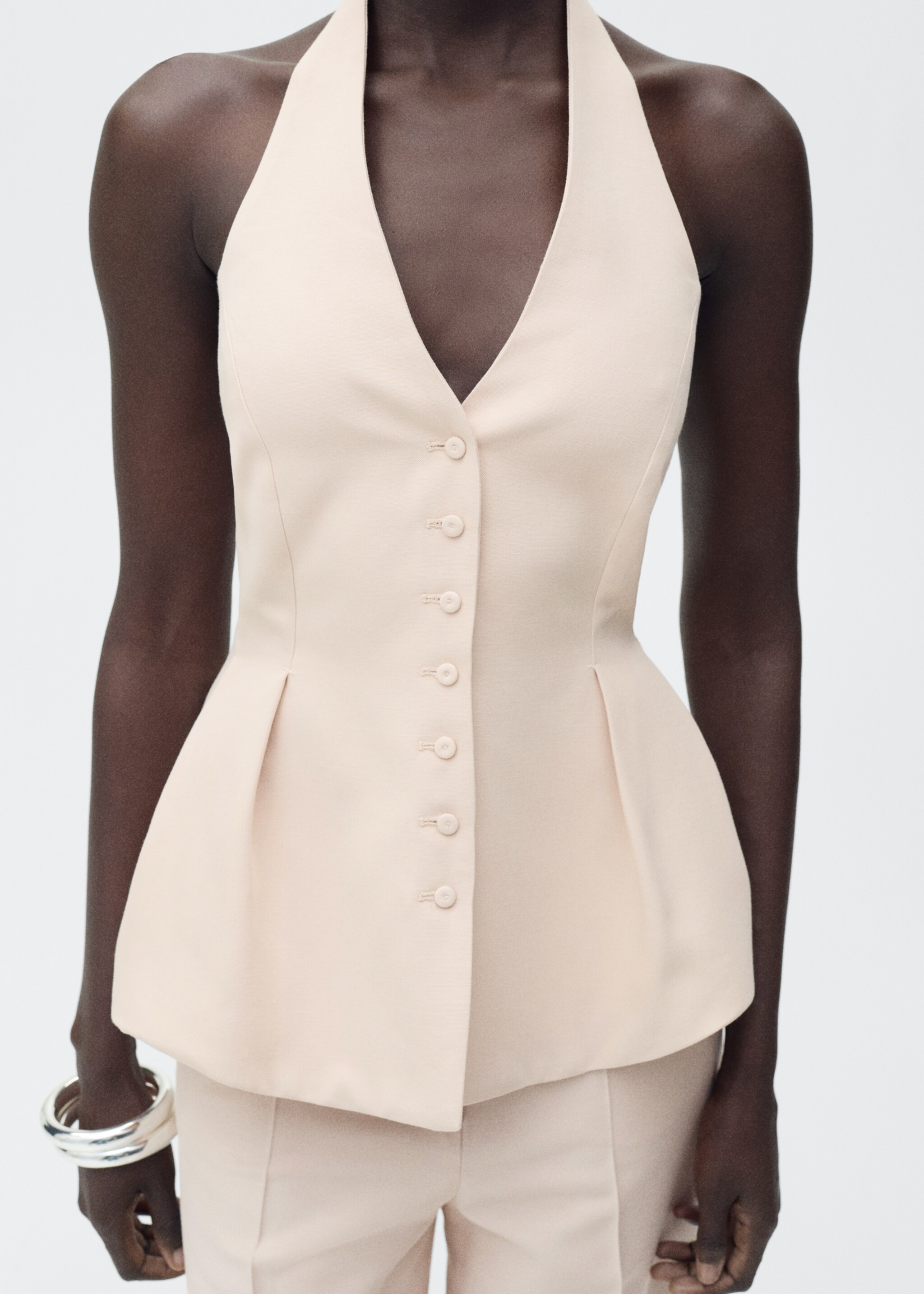 Halter-neck waistcoat with pleats - Details of the article 1, Nude. Ref: 87045769-00.