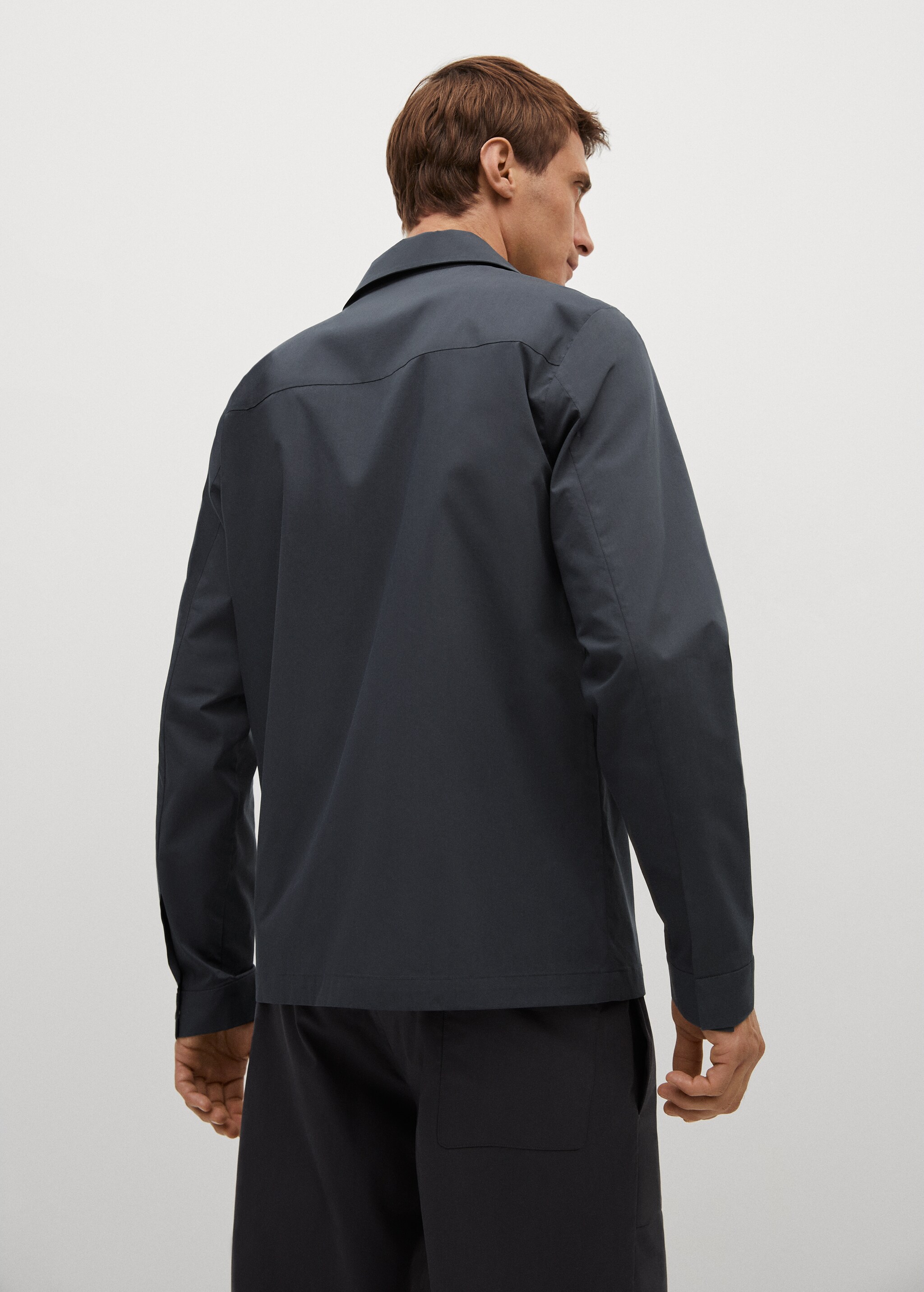 Chaqueta bolsillos tejido premium - Reverso del artículo