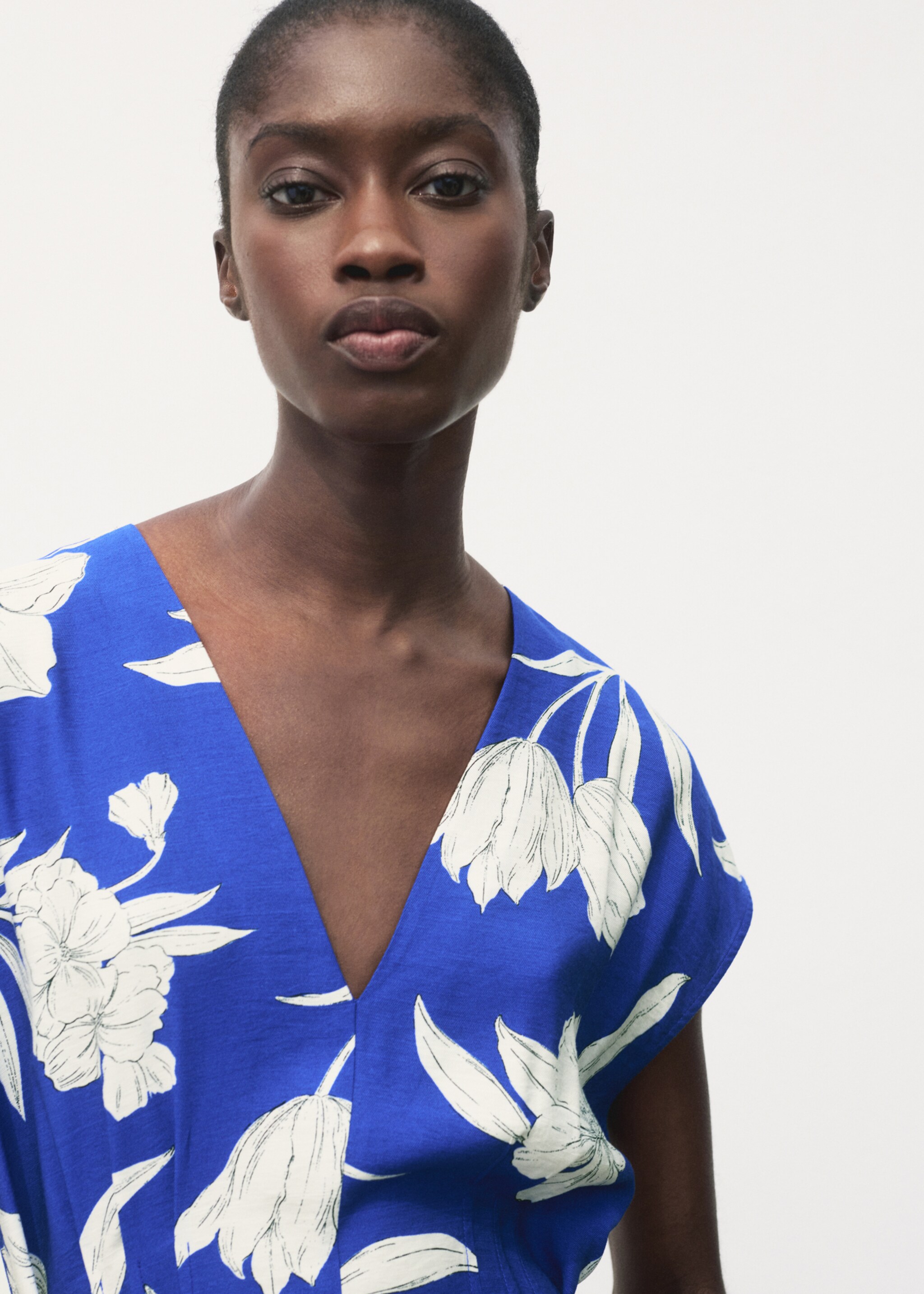 Printed long jumpsuit with belt - Details of the article 1, Blue. Ref: 87047184-00.