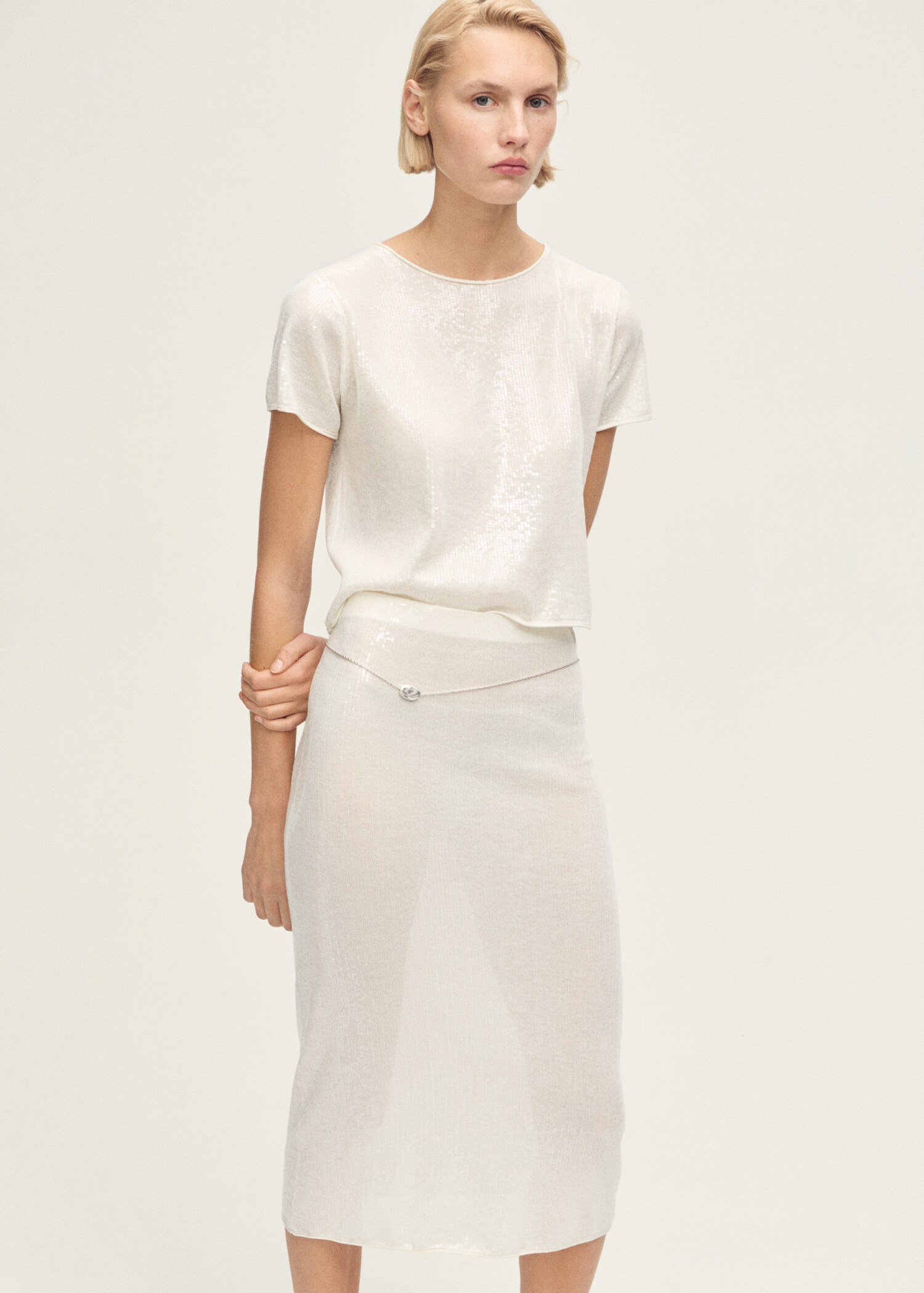 Kortärmad stickad paljettröja - Bild av mittparti