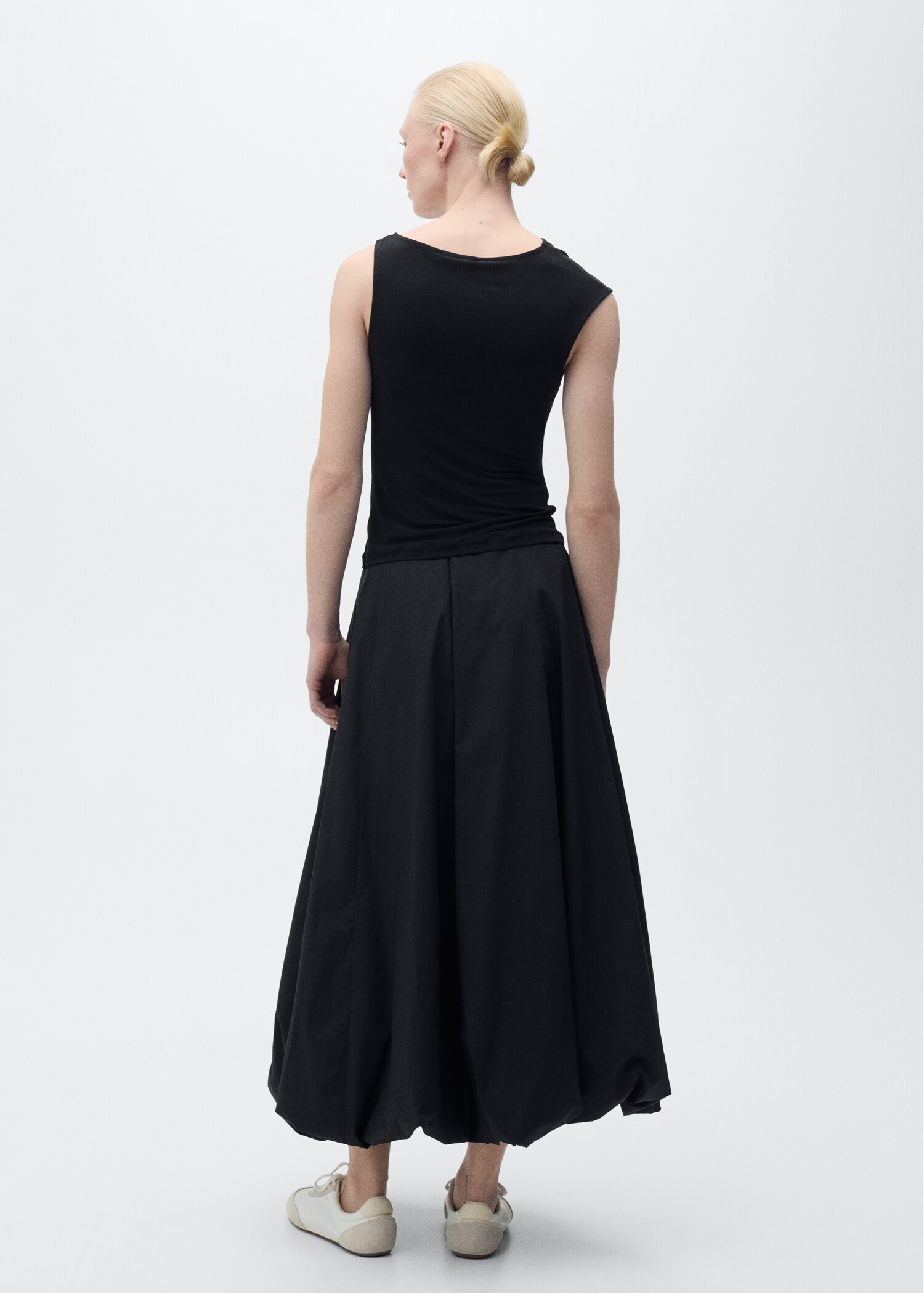 Top asimètric aplic metàl·lic - Revers de l'article