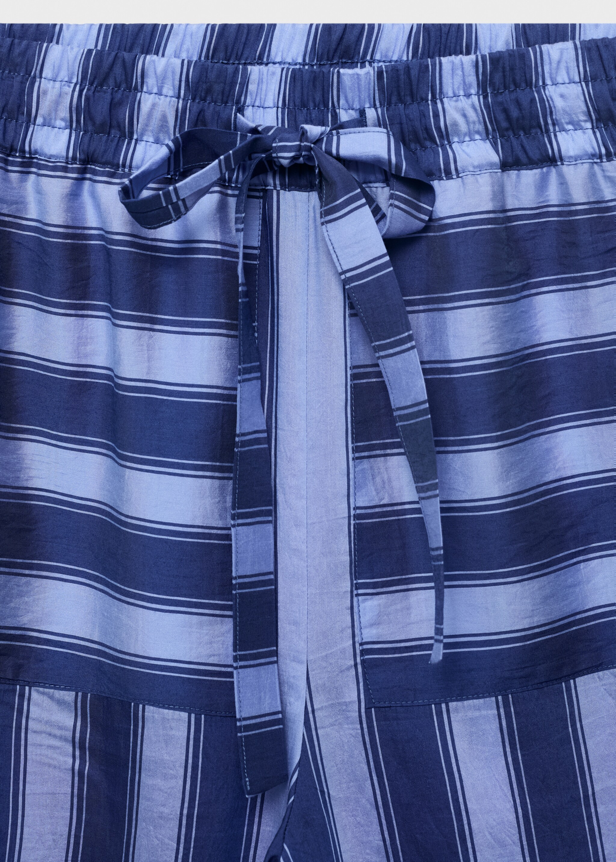 Woven lyocell trousers with two-tone stripes - Details of the article 8, Blue. Ref: 87048651-00.