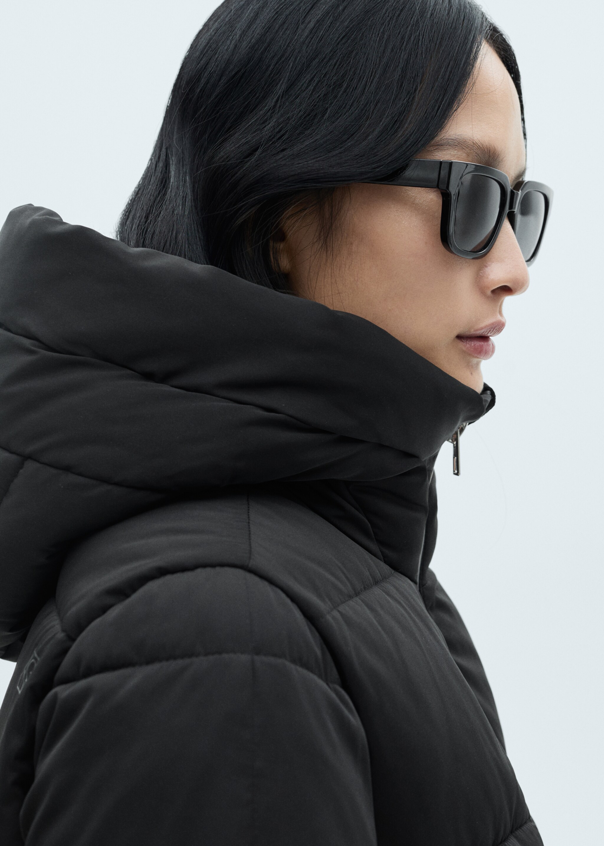 Midi quilted anorak with hood - Details of the article 1, Black. Ref: 87050306-00.