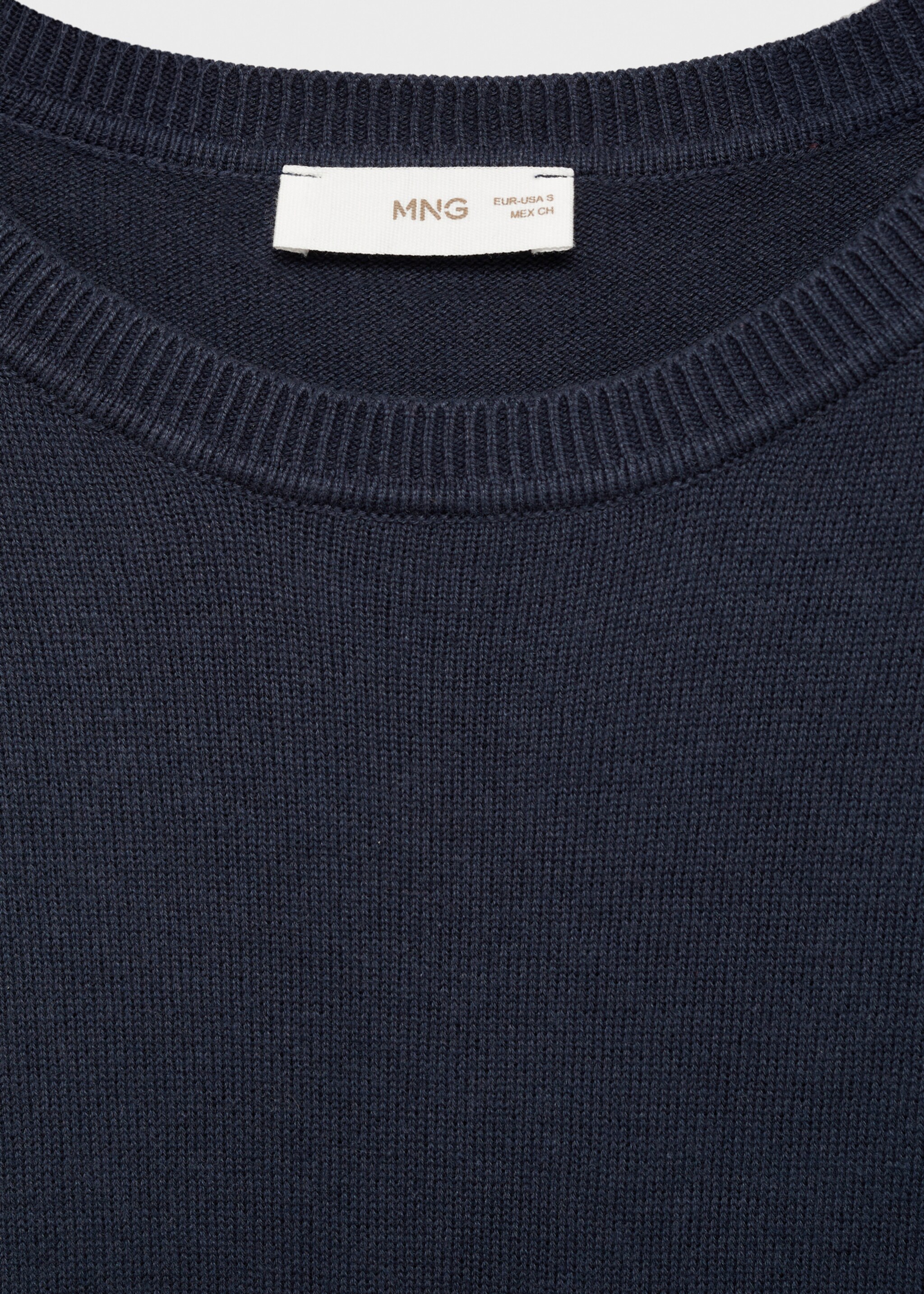 Jersei punt cotó - Detall de l'article 8, Blau marí fosc. Ref: 87051050-00.