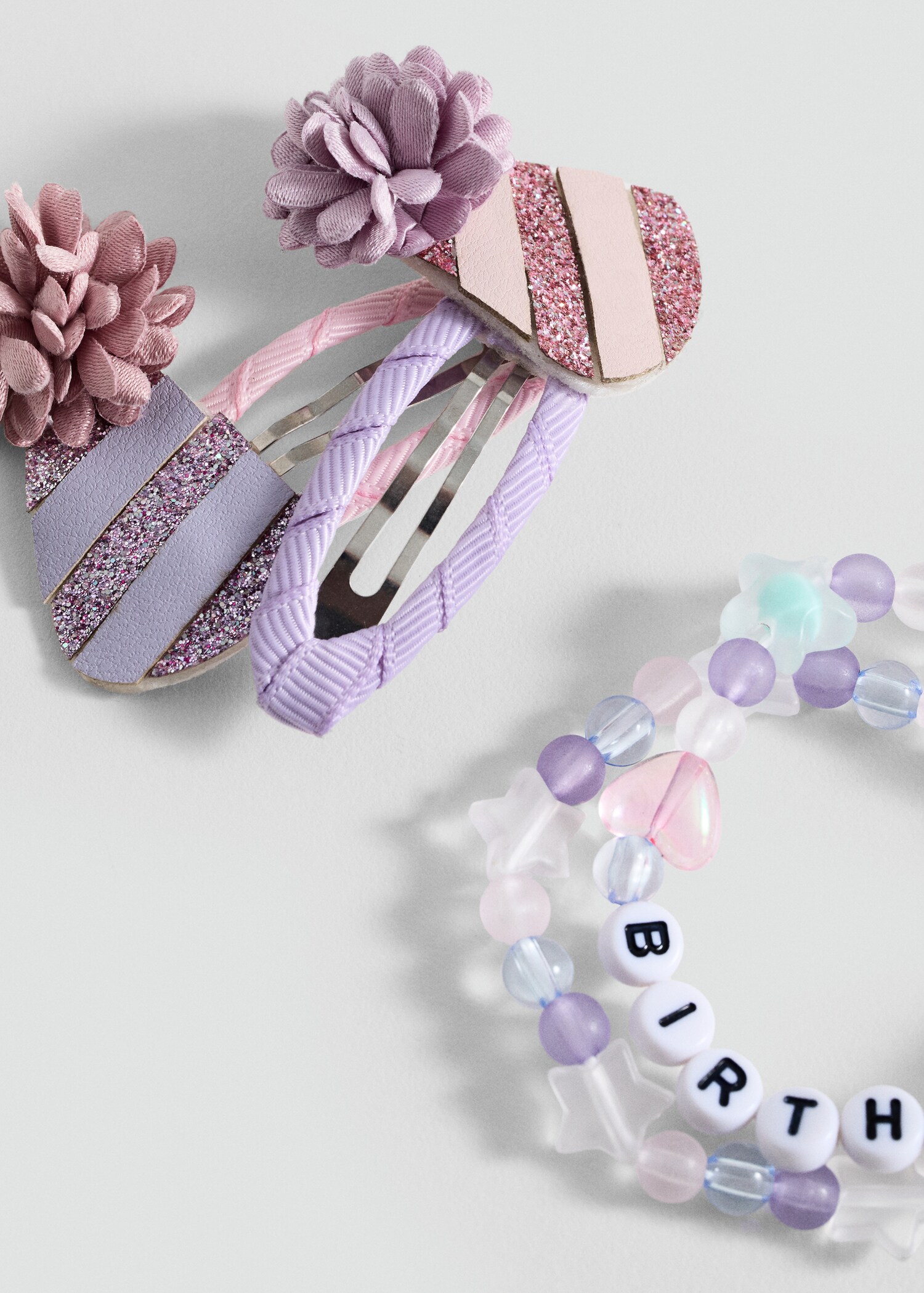 2-pack hårspännen och armband - Bild av mittparti