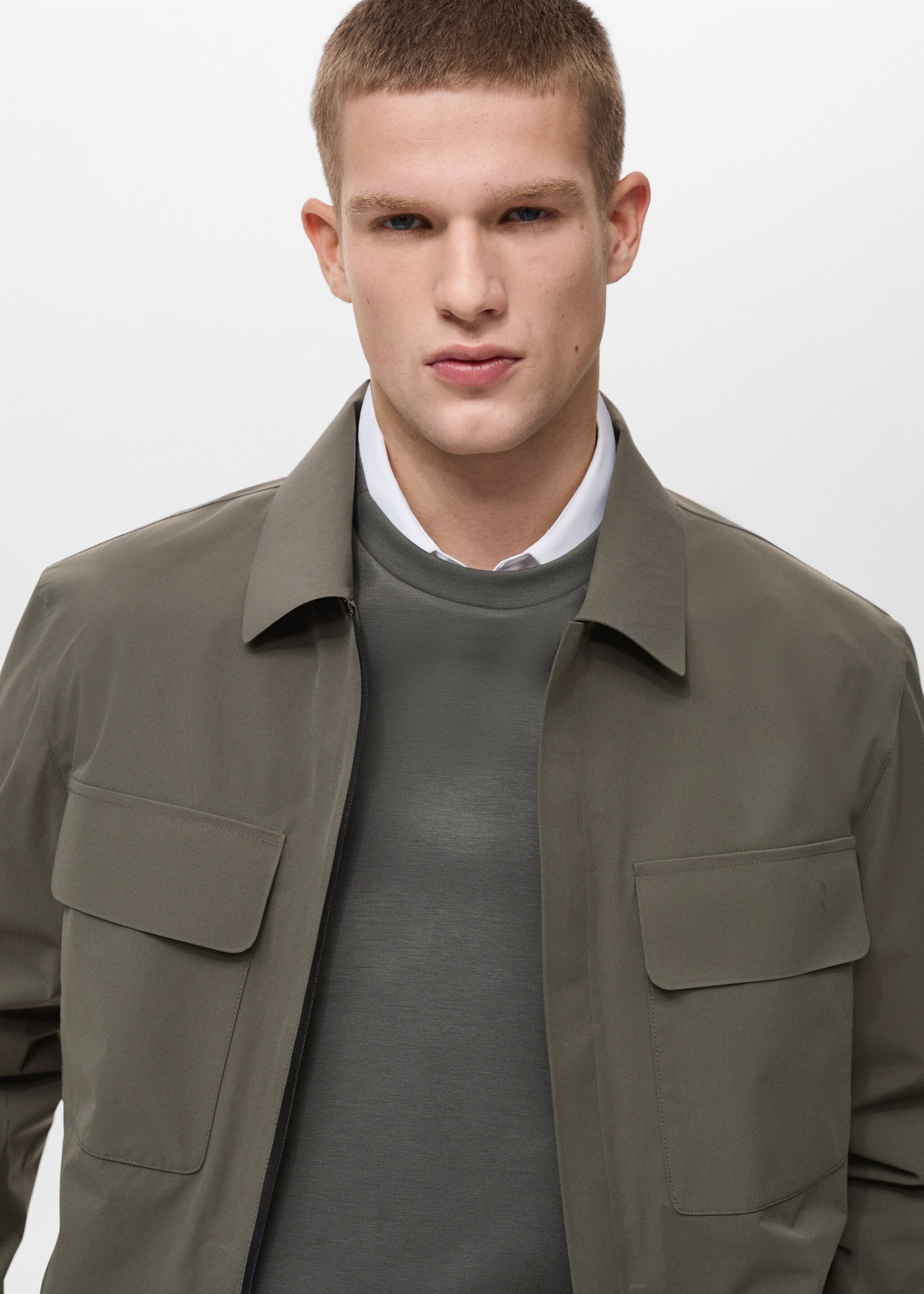 Water-repellent jacket with pockets - Details of the article 1, Medium Green. Ref: 87054389-00.