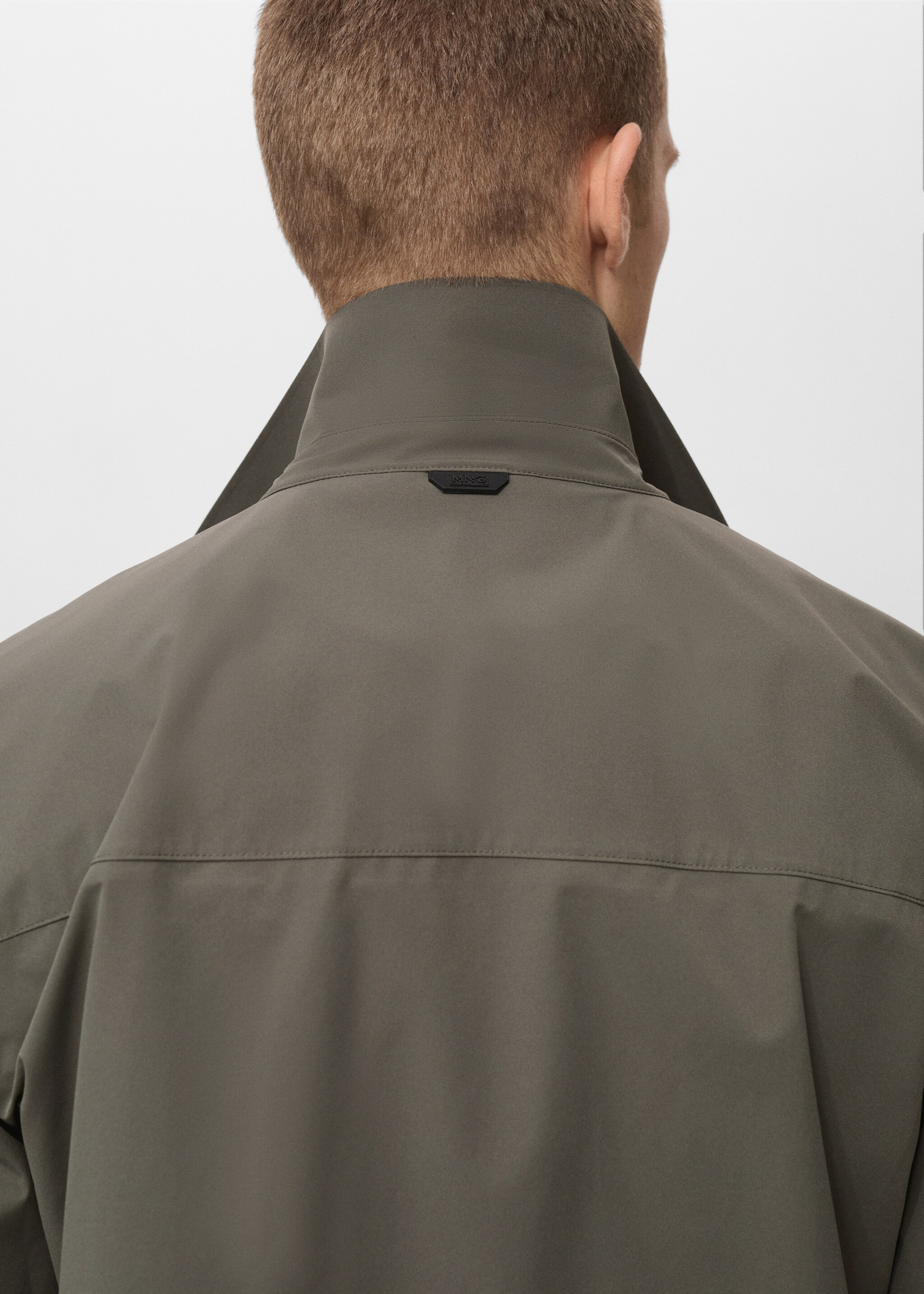 Water-repellent jacket with pockets - Details of the article 6, Medium Green. Ref: 87054389-00.