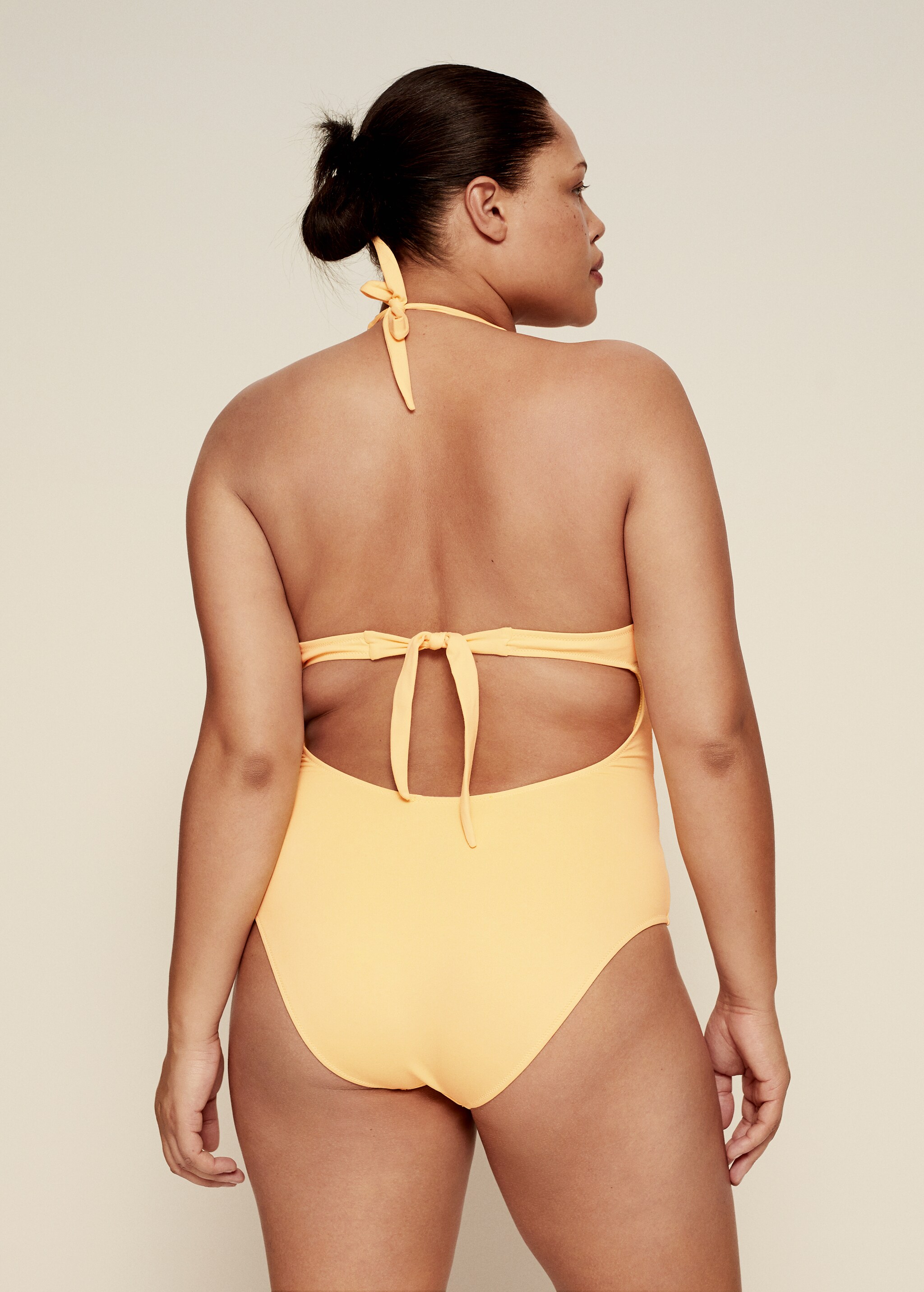 Open-back swimsuit with knot - Reverse of the article