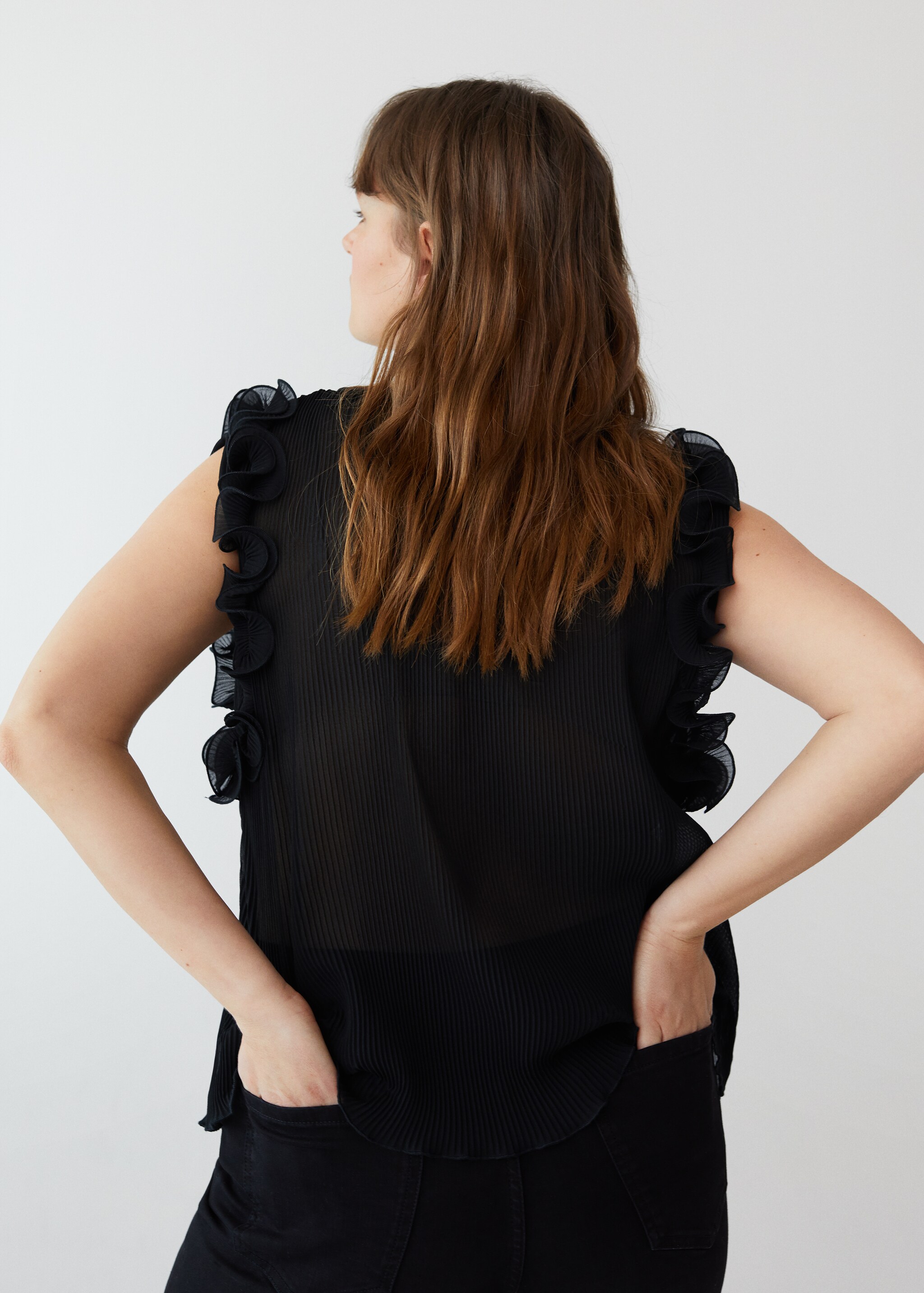 Blusa plisada volantes - Reverso del artículo