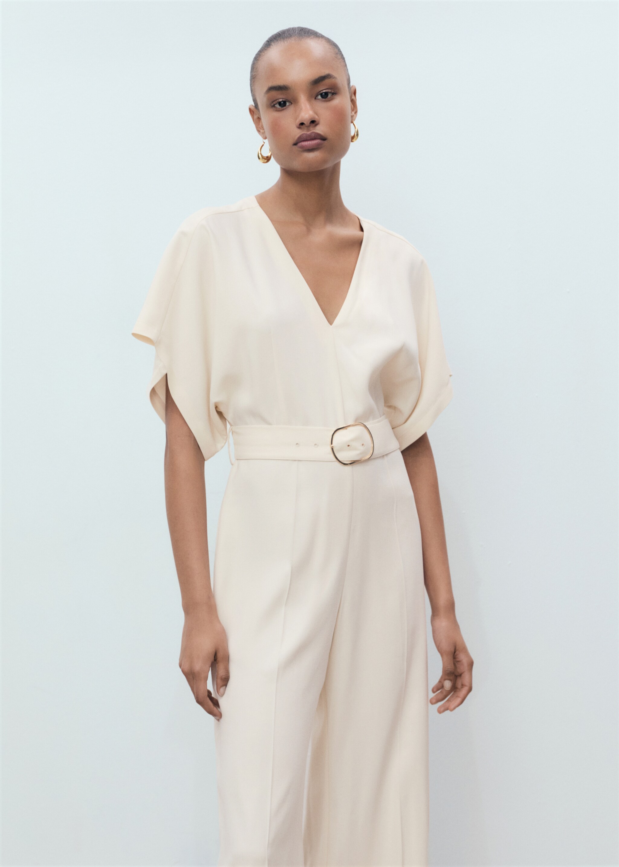 Long jumpsuit with belt and buckle - Medium plane, Ecru. Ref: 87055754-00.