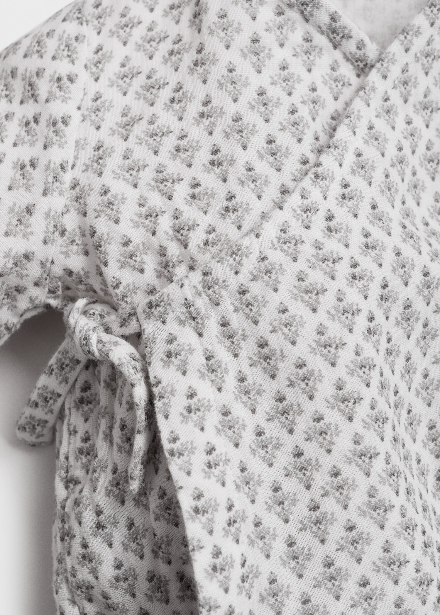 Printed crossover romper suit - Details of the article 8