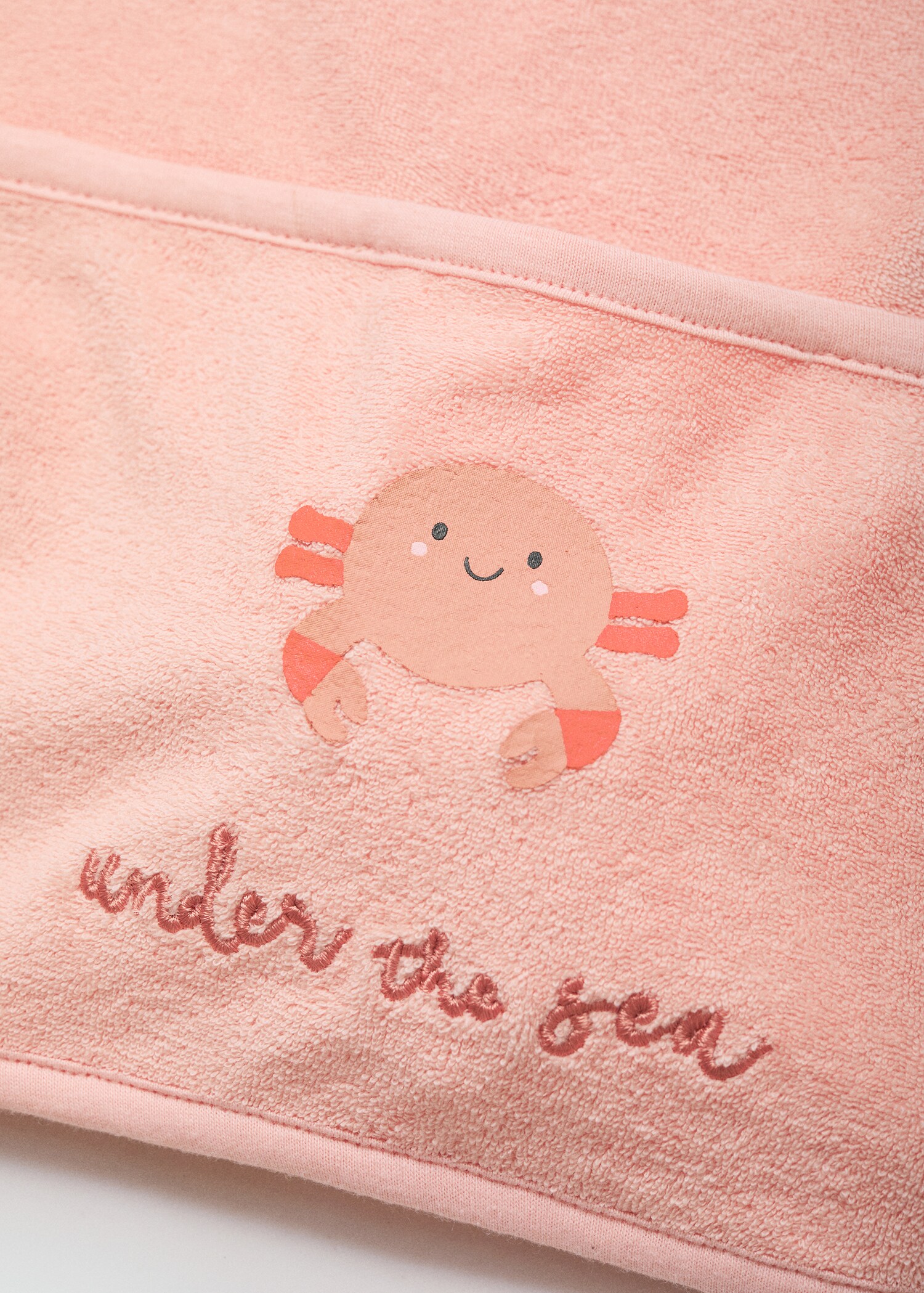 Terry cloth bib with embroidered details - Details of the article 1