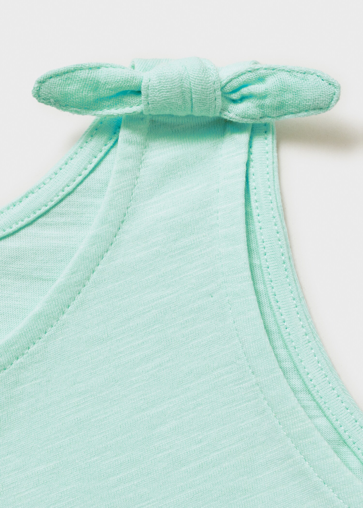 Kurzer Jumpsuit mit Schleifendetail - Detail des Artikels 8