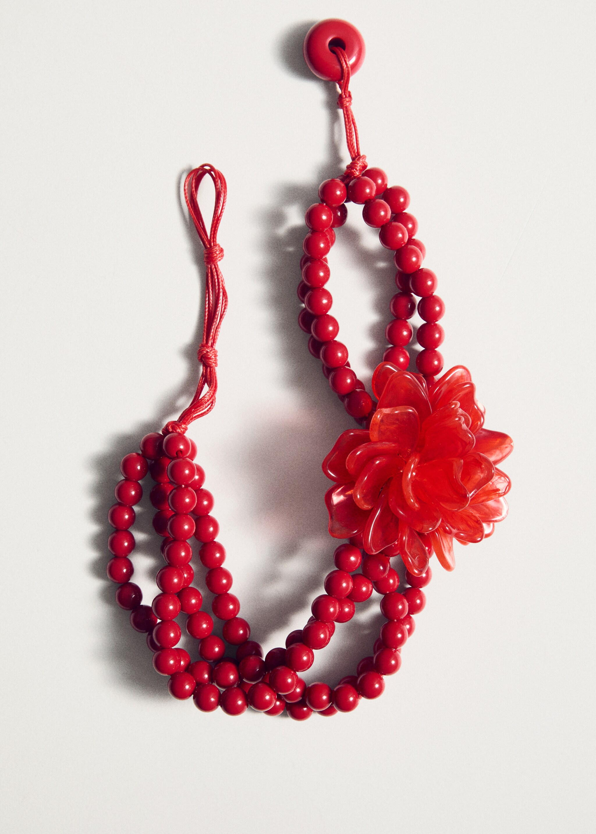 Kugelhalskette mit Blumendetail - Detail des Artikels 5, Rot. Ref: 87057700-00.