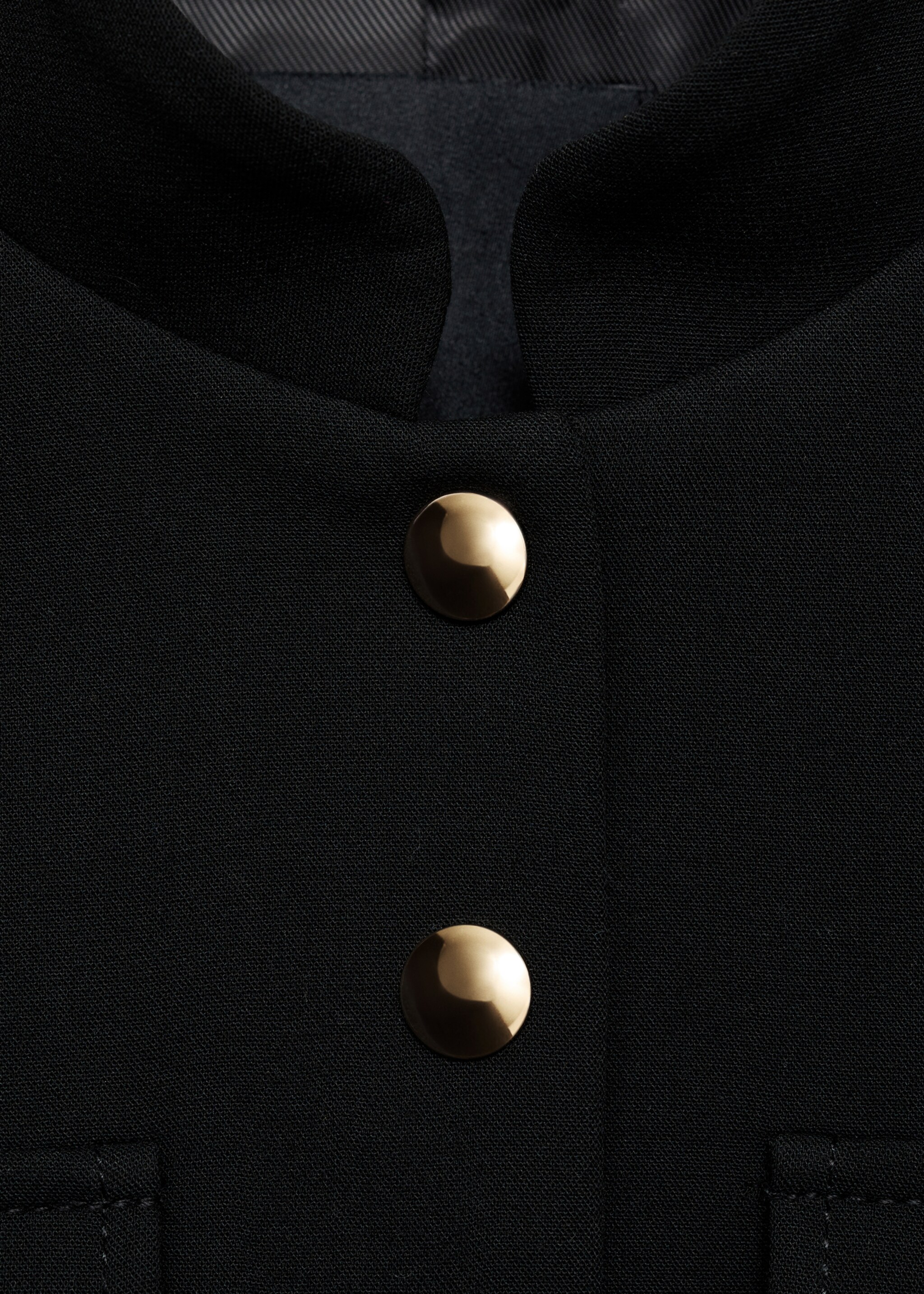 Jacket pockets with button detail - Details of the article 8, Black. Ref: 87060429-00.