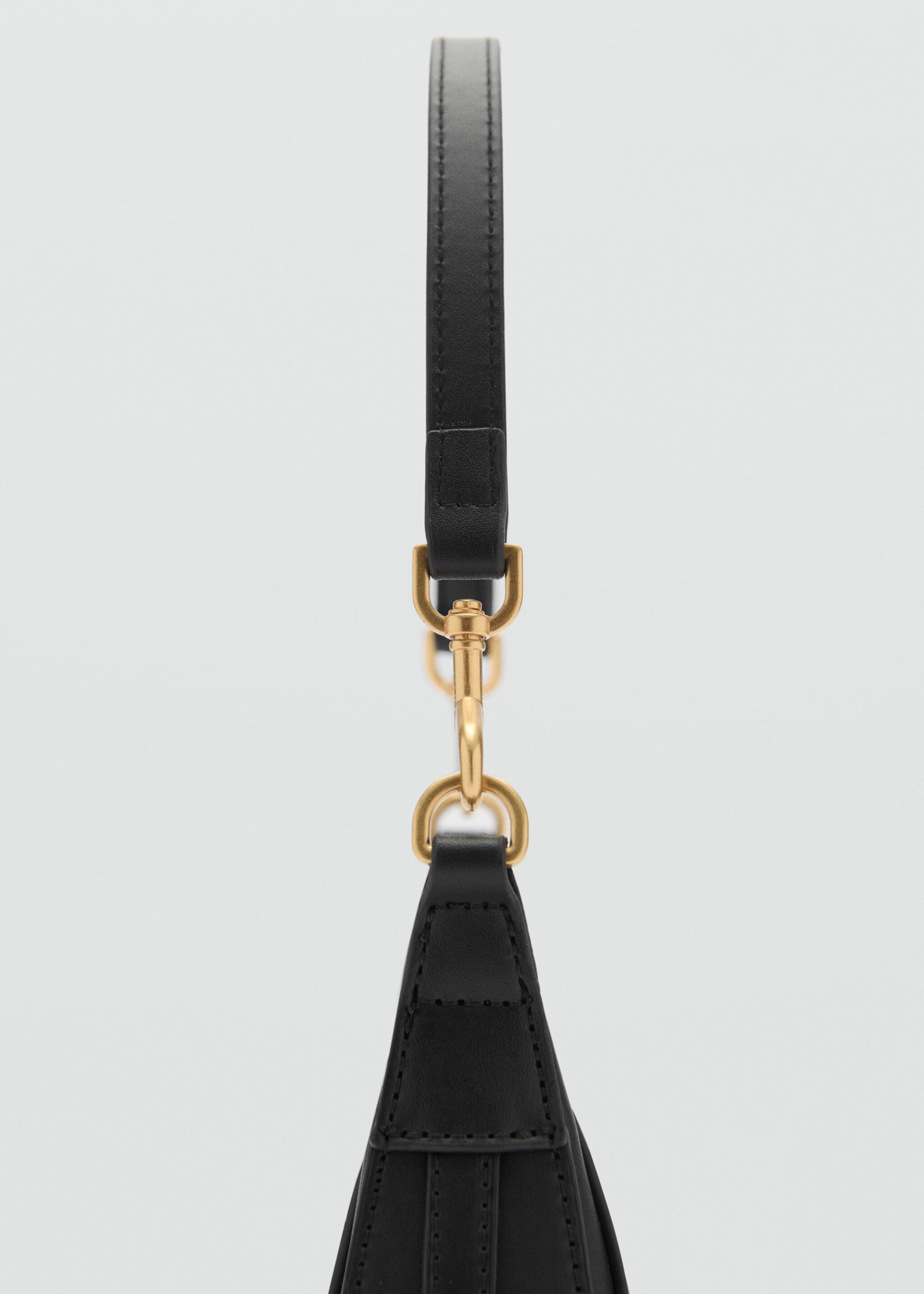 Mini oval crossbody bag - Details of the article 1, Black. Ref: 87060443-00.