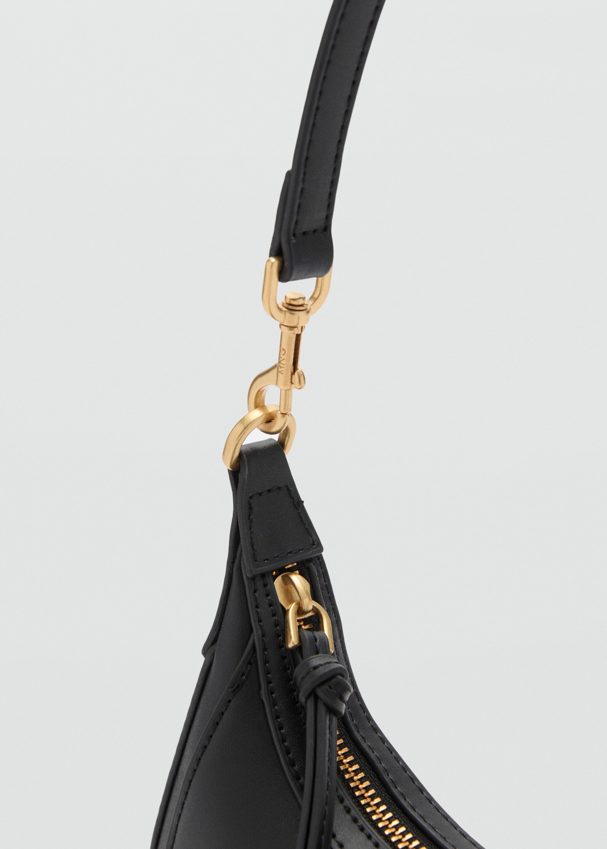 Mini oval crossbody bag - Details of the article 2, Black. Ref: 87060443-00.