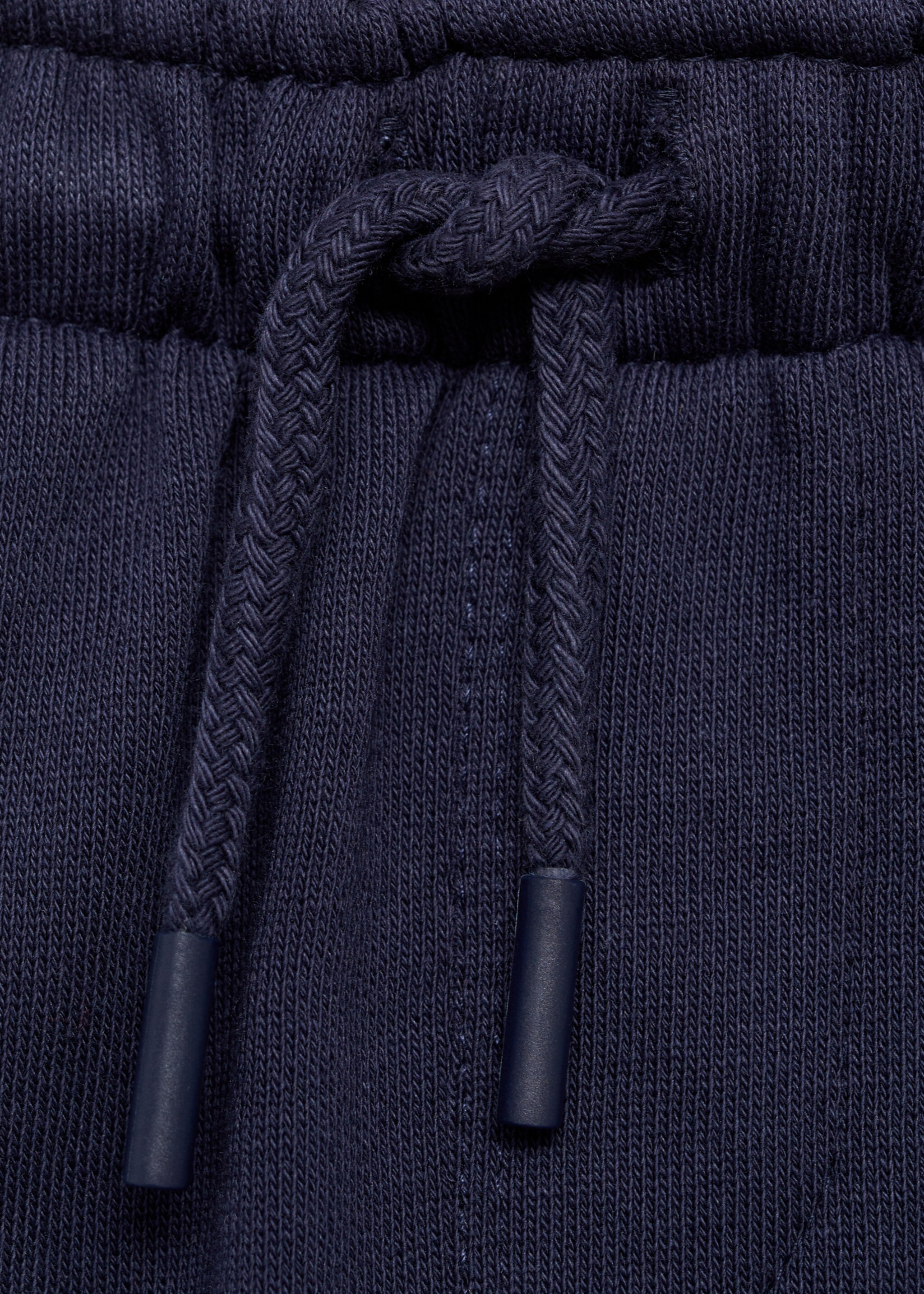 Cotton jogger-style trousers - Details of the article 8, Dark Navy. Ref: 87060635-00.