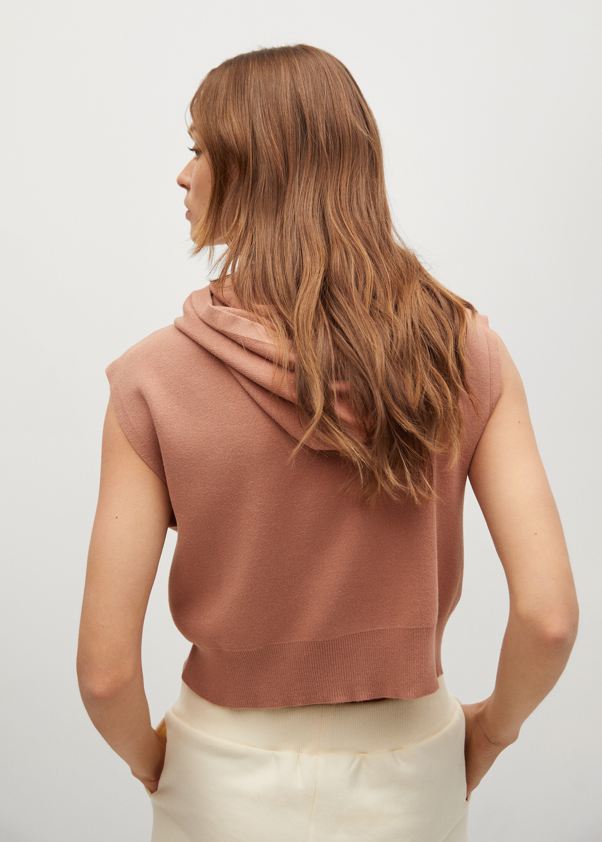 Knitted gilet with hood - Reverse of the article