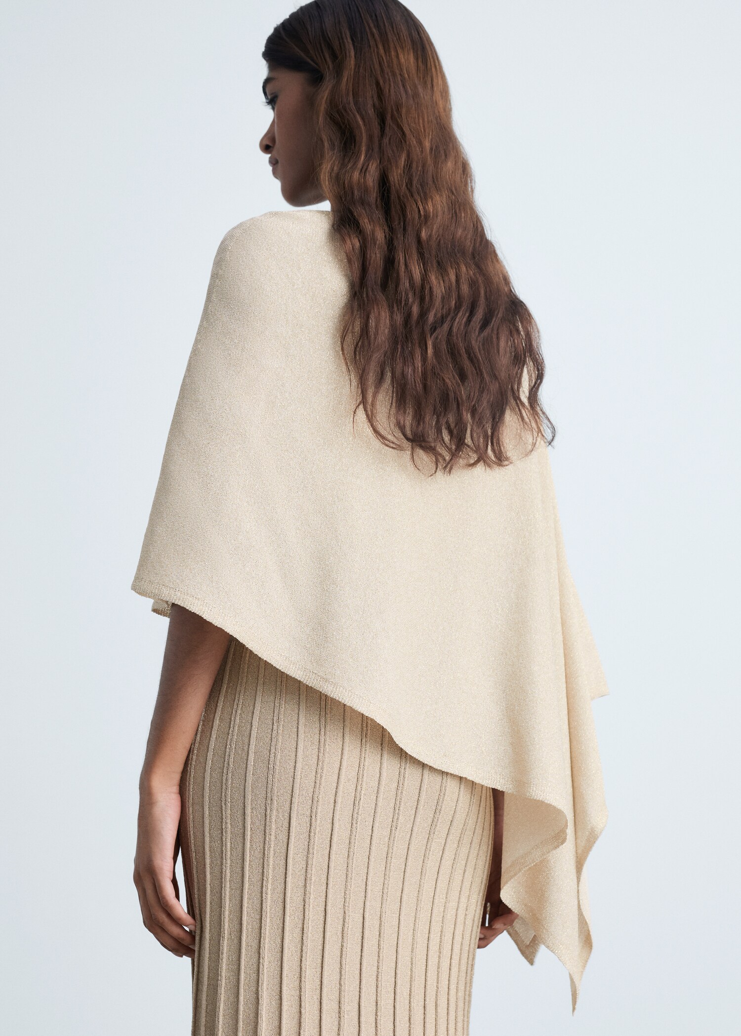 Asymmetrical lurex knitted cape - Reverse of the article