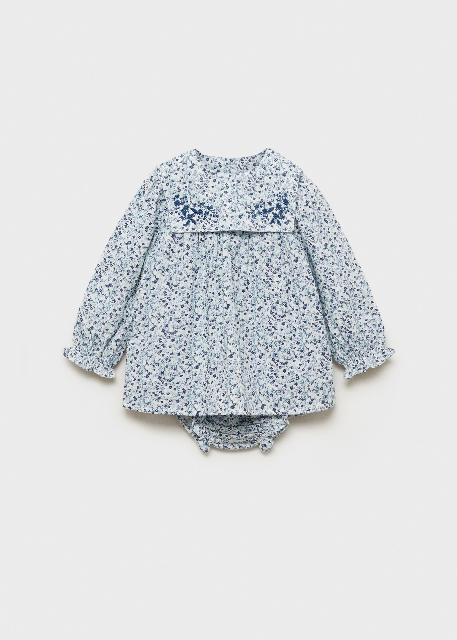 Mönstrad klänning och kortbyxa - Artikel utan modell