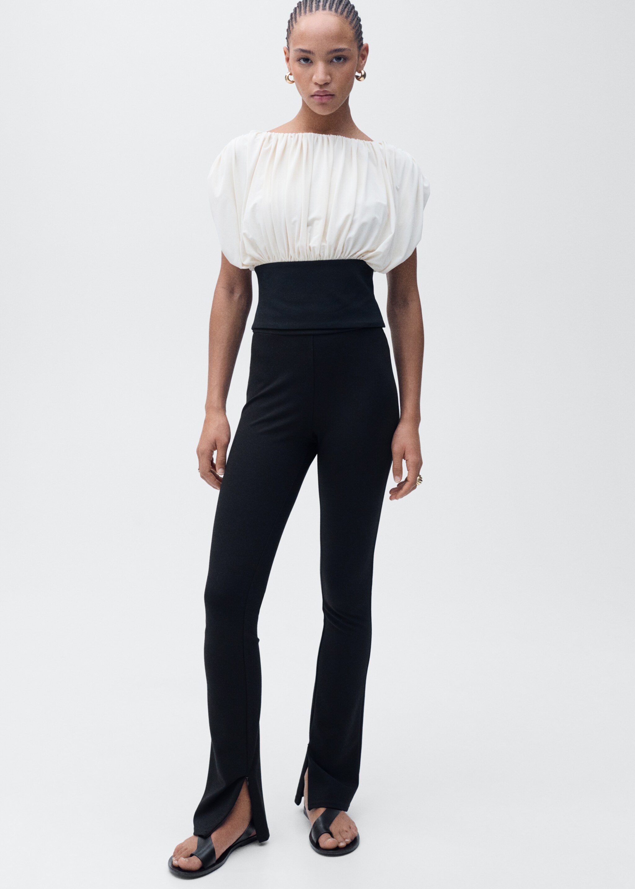 Skinny trousers with openings - Details of the article 2, Black. Ref: 87065741-00.