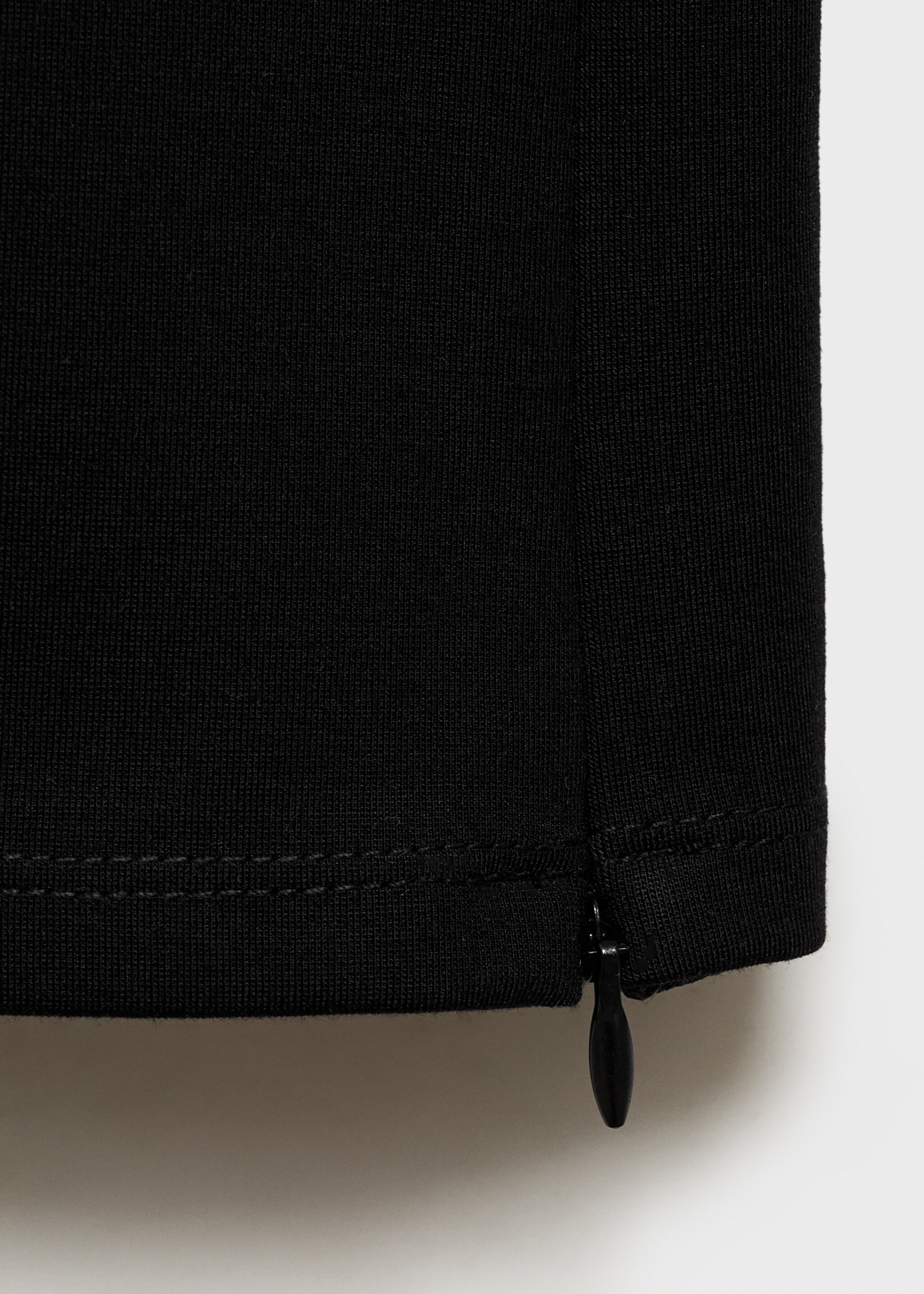 Skinny trousers with openings - Details of the article 8, Black. Ref: 87065741-00.