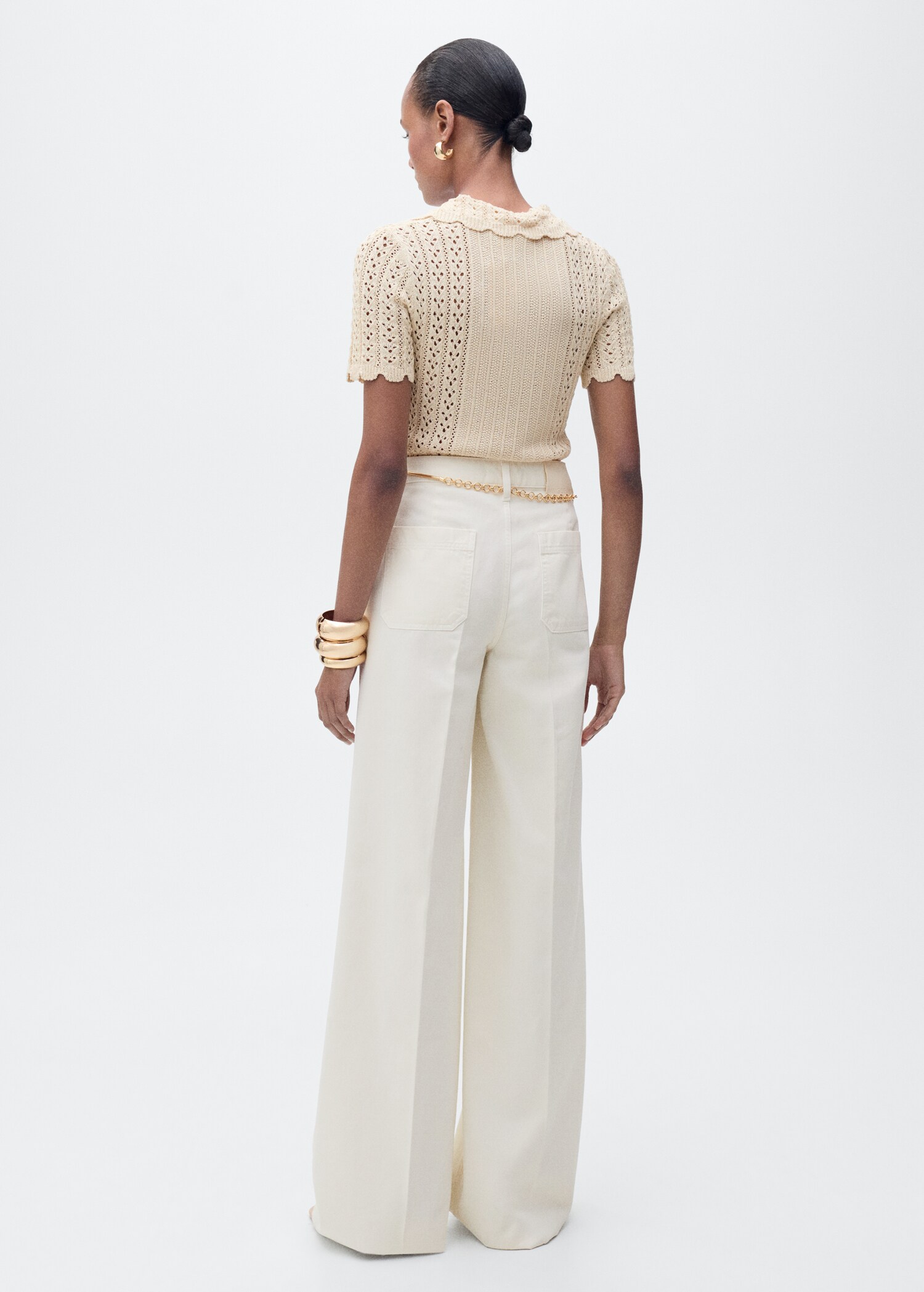 Openwork knitted polo-neck sweater - Reverse of the article